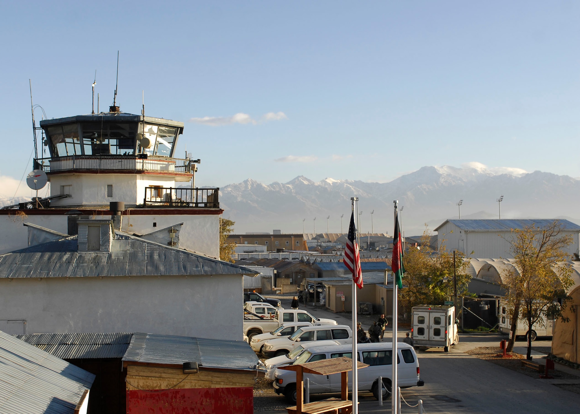 BAGRAM AIRFIELD, Afghanistan -- Beautiful mountains in Afghanistan are visible behind the old Russian Control Tower, known as the Crow's Nest,   Nov. 9, 2009.  The Russian Control Tower was built in 1976 during the Soviet Union's occupation of the region.  Currently more than 5,000 Airmen are deployed to Bagram supporting Operation Enduring Freedom and NATO International Security Assistance Forces.  (U.S. Air Force photo/Senior Airman Felicia Juenke)