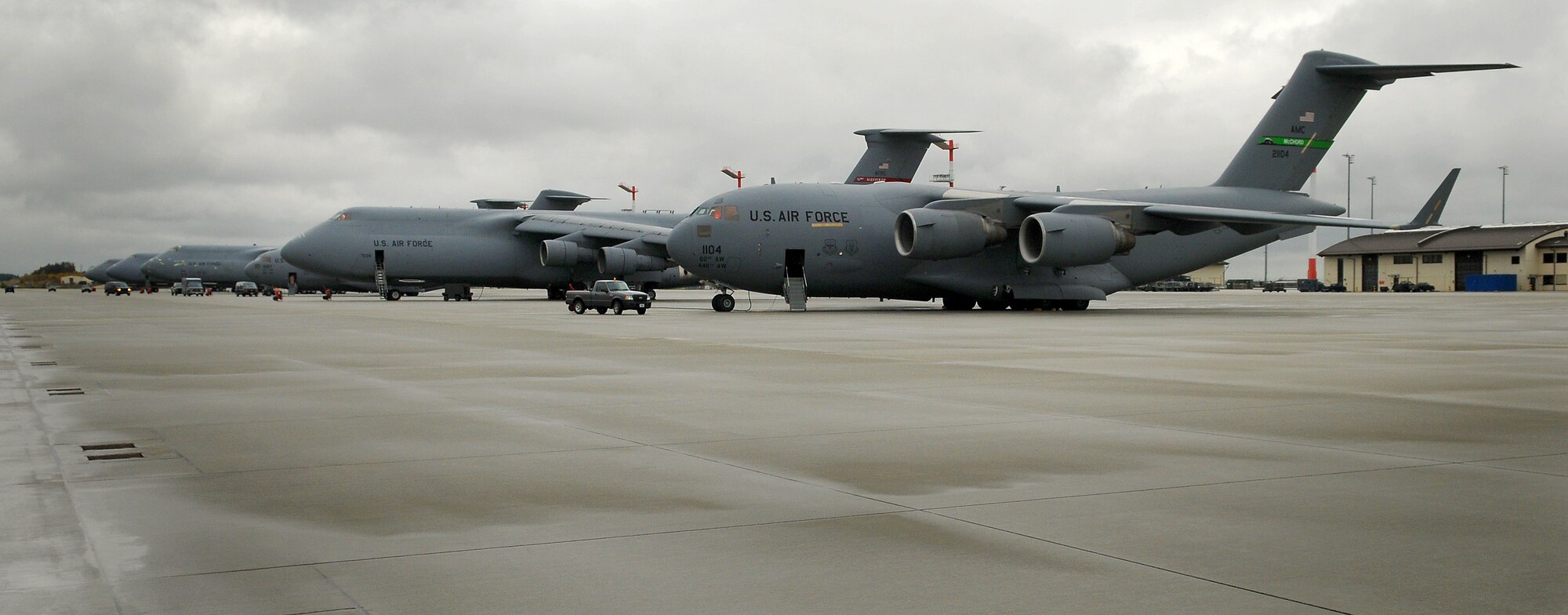 SPANGDAHLEM AIR BASE, Germany -- A fleet of cargo aircraft line the Spangdahlem Air Base flightline Nov. 5. The 726th Air Mobility Squadron is responsible for the refueling and repair of planes supporting various contingencies around the world. (U.S. Air Force photo/Airman 1st Class Nathanael Callon)