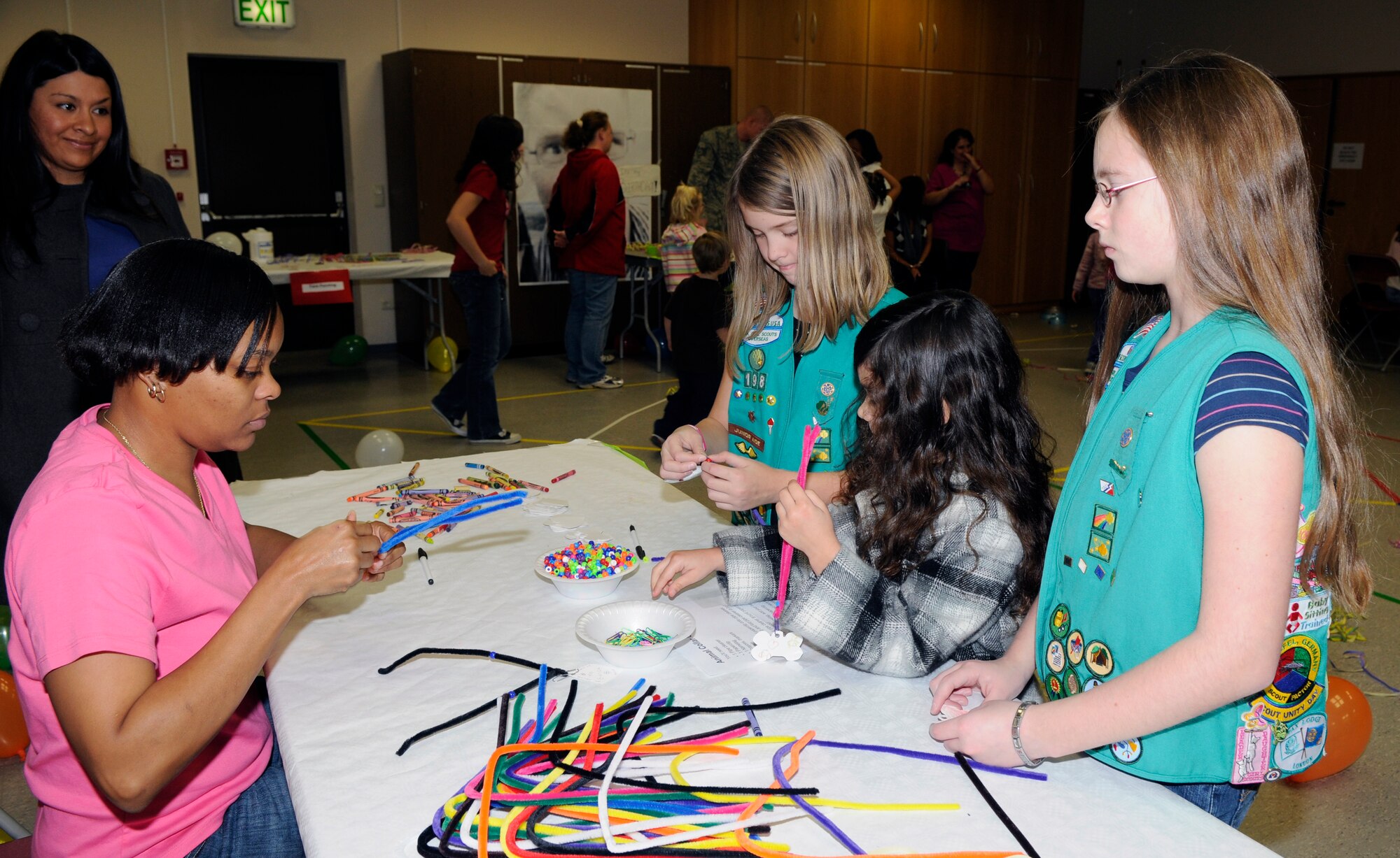 SPANGDAHLEM AIR BASE, Germany – Girl Scouts from Troop 198 make crafts to donate to the Trier Tierheim animal shelter during the Girl Scout Founder’s Day celebration at the Spangdahlem Chapel Annex Nov 6. Founder’s Day marks the birth of Girl Scouts founder Juliette Low. (U.S. Air Force photo/Airman 1st Class Staci Miller)