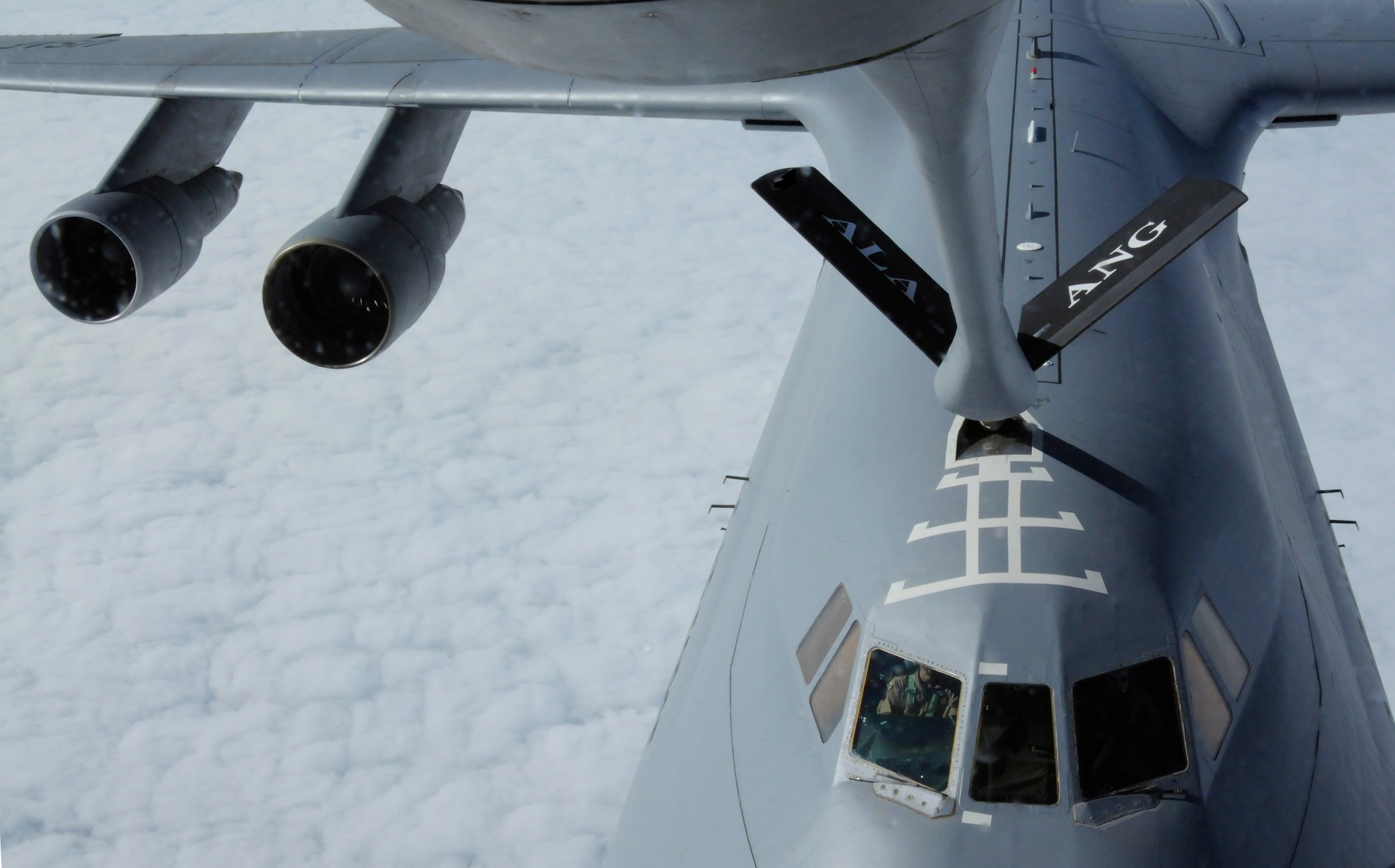 The boom makes connection with a C-130 during a refueling flight, Oct. 27, 2009, over the Black Sea. The 90th EARS supports the ongoing mission for Operations Iraqi Freedom and Enduring Freedom. (U.S. Air Force photo/Airman 1st Class Amber Ashcraft)