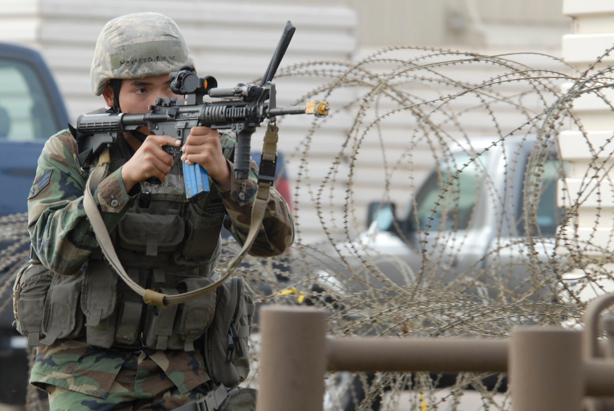 KUNSAN AIR BASE, Republic of Korea -- Senior Airman Emile Navarro, 8th Security Forces Squadron, advances to support his partner's defensive position during Exercise Beverly Bulldog 0904 here Nov. 9. This scenario tested the 8 SFS ability to respond to a simulated attack. (U.S. Air Force photo/Staff Sgt. Darnell T. Cannady)