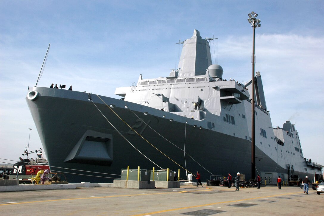 The amphibious transport dock ship Pre-Commissioning Unit New York LPD 21 arrives at her home port of Naval Station Norfolk, Va., for the first time Oct. 22, 2009. The ship, the fifth of nine San Antonio-class amphibious transport dock ships and the first to be named after a state, was named in remembrance of the victims of the Sept. 11 terrorist attack. The ship has 7.5 tons of World Trade Center steel in her bow and is scheduled for commissioning Nov. 7, 2009.