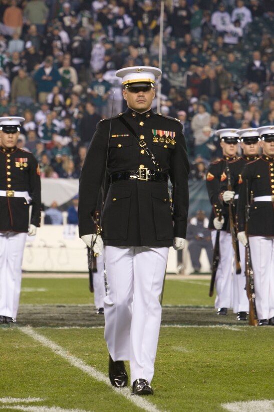 Capt. John McLaughlin leads the Silent Drill Platoon during a performance at the half-time show of the Philadelphia Eagles vs. Dallas Cowboys football game in Philadelphia, Nov. 8. The SDP has performed at several National Football League games throughout the 2009 football season.