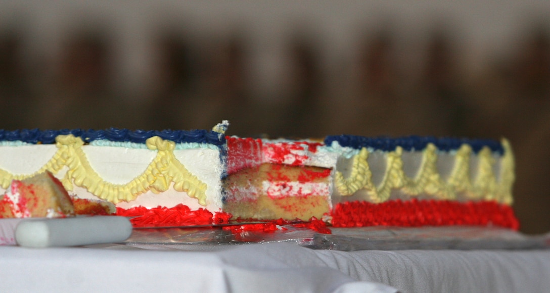 The remainder of the 234th Marine Corps birthday cake after the youngest and oldest Marines with Combat Logistics Regiment 27 (Forward) ate the first bite, a Corps-wide tradition, during the ceremony held aboard Camp Al Taqaddum, Iraq, Nov. 10, 2009.  Following the ceremony the Marines gathered to enjoy refreshments and camaraderie that Marines are known for.  (U.S. Marine Corps photograph by Lance Cpl. Melissa A. Latty)