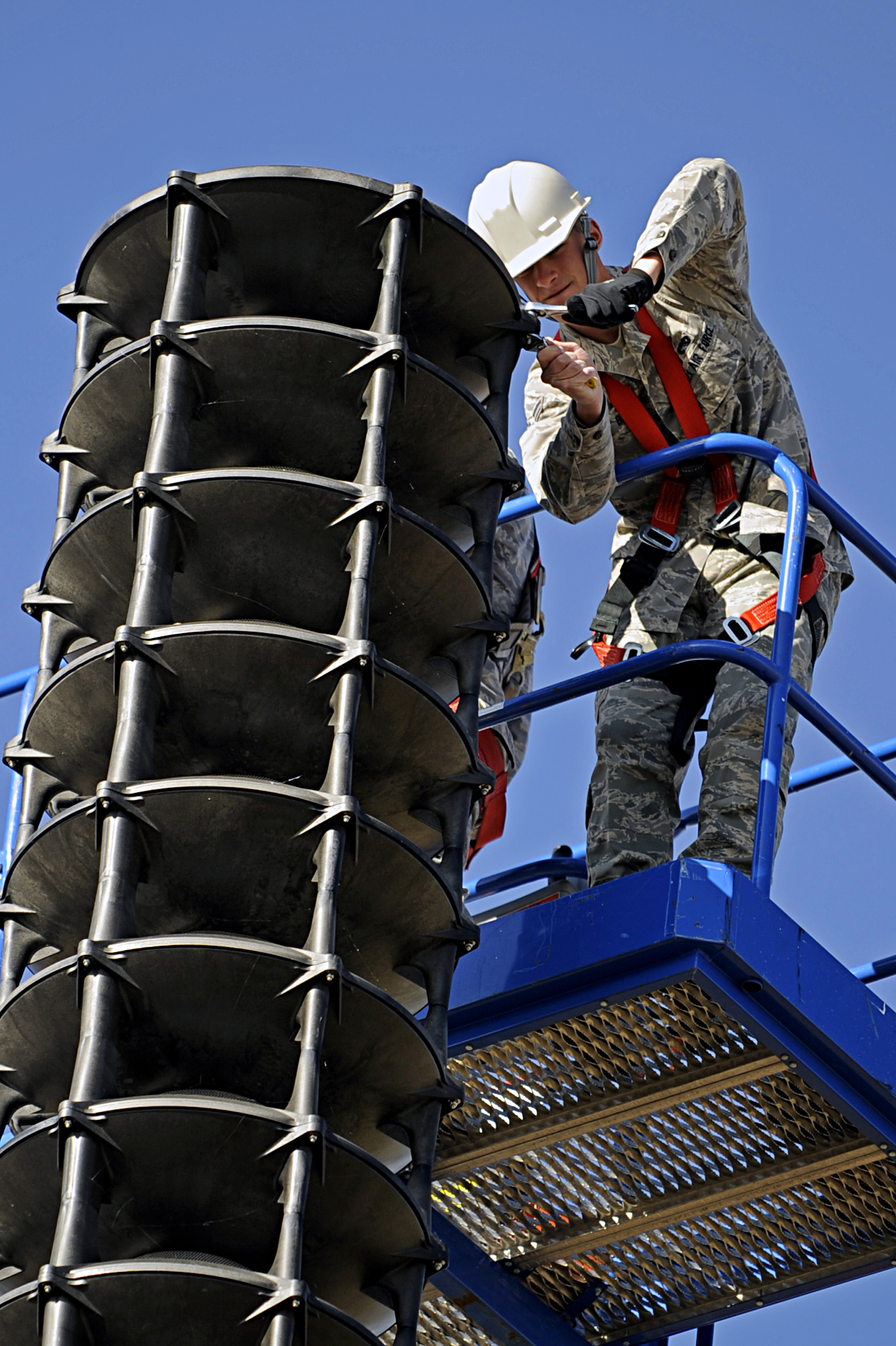 Radio technicians repair speaker > Ellsworth Air Force Base > Article Display