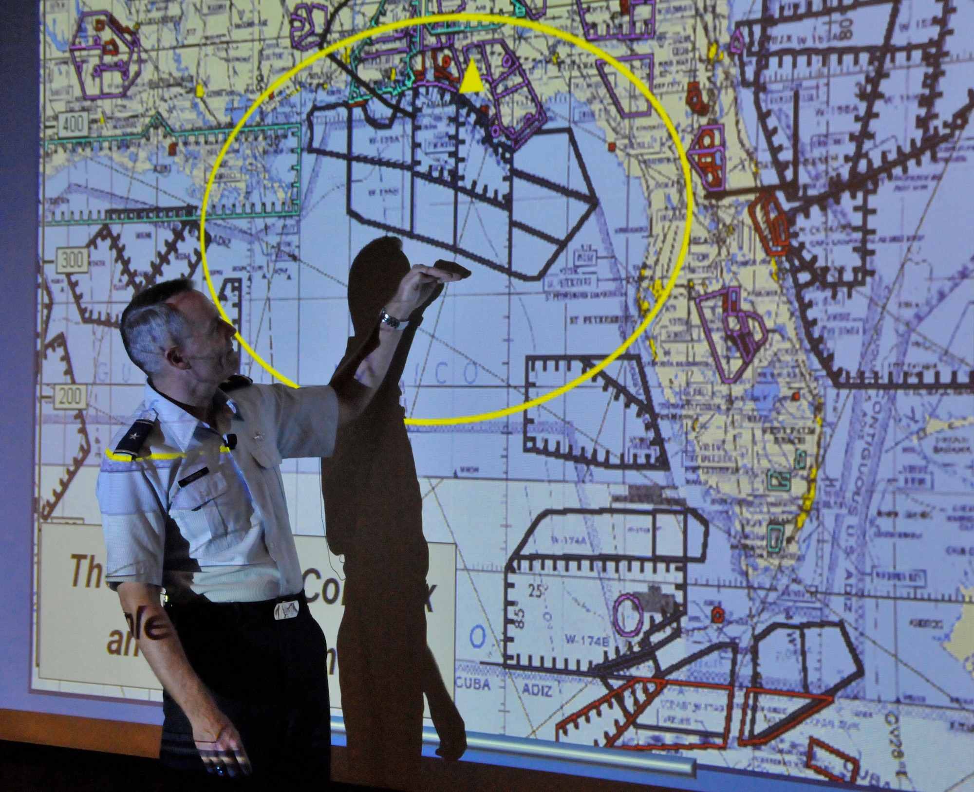 Brigadier General Darryl Roberson outlines the Gulf Range Complex during the State of Tyndall address Nov. 9 at the Heritage Club. (U.S. Air Force photo by Lisa Norman)