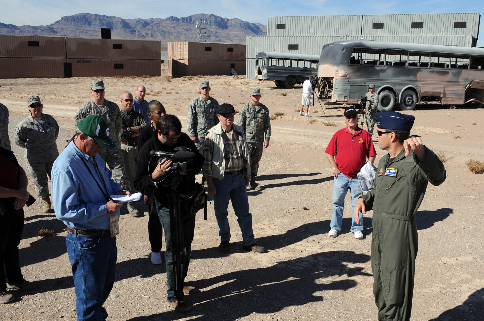NEVADA TEST AND TRAINING RANGE-- Col. John P. Montgomery, 98th RANW commander, speaks to a group during a tour of the Urban Operations Complex Thursday Nov. 5, 2009. Civic leaders and media visited the UOC for the first time ever to view training operations. (U.S. Air Force photo by Tech. Sgt. Michael R. Holzworth)