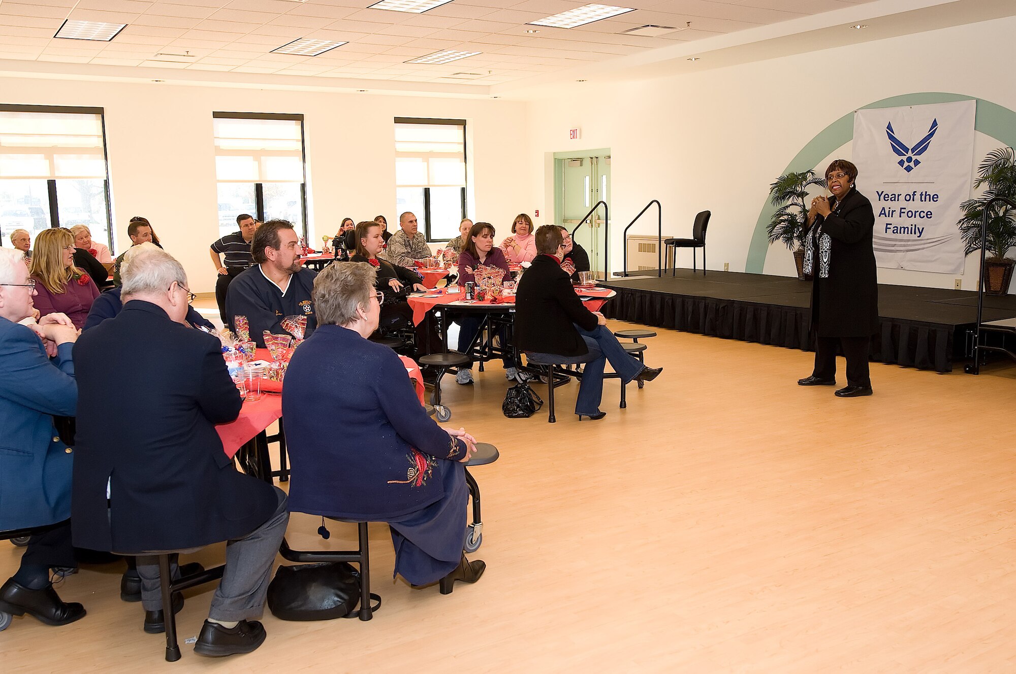 Pat Edwards, 436th Force Support Squadron community readiness consultant for the Airman and Family Readiness Center, speaks at the Year of the Air Force Family Volunteer Coordinators Ceremony Nov. 6 about the importance of education, communication and the values that are embedded into volunteer excellence. The ceremony was held to recognize the individuals who helped facilitate volunteers working on Dover Air Force Base. (U.S. Air Force photo/Jason Minto)