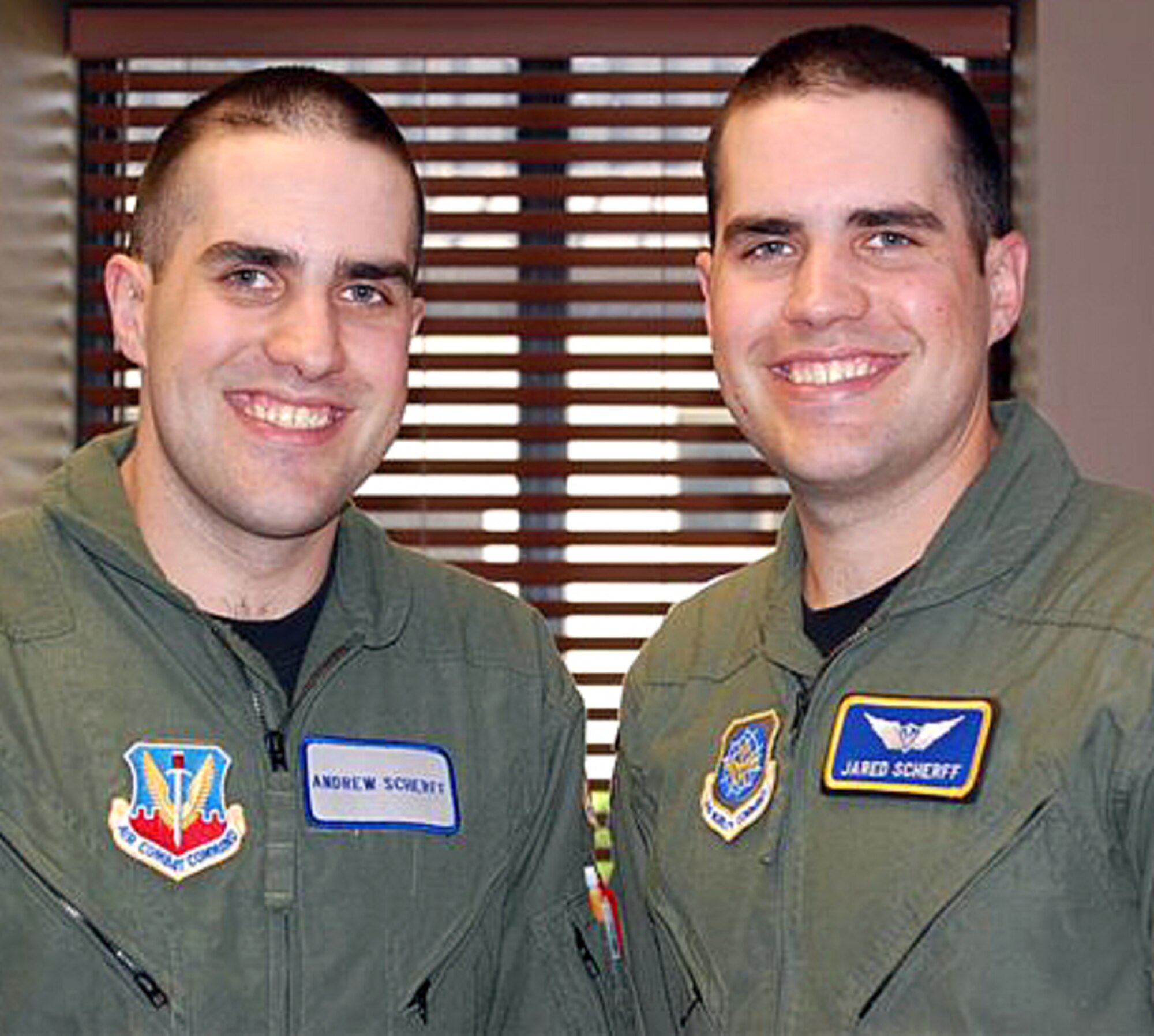 Second Lt. Andrew Scherff, left, visits his twin brother, 2nd Lt. Jared Scherff, at Dover AFB, Del., May 26, 2008, while both awaited pilot training. During that time, Andrew worked as a B-2 simulator scheduler for the 394th Combat Training Squadron at Whiteman AFB, Mo. Jared worked as a 3rd Airlift Squadron executive officer. (Courtesy photo)