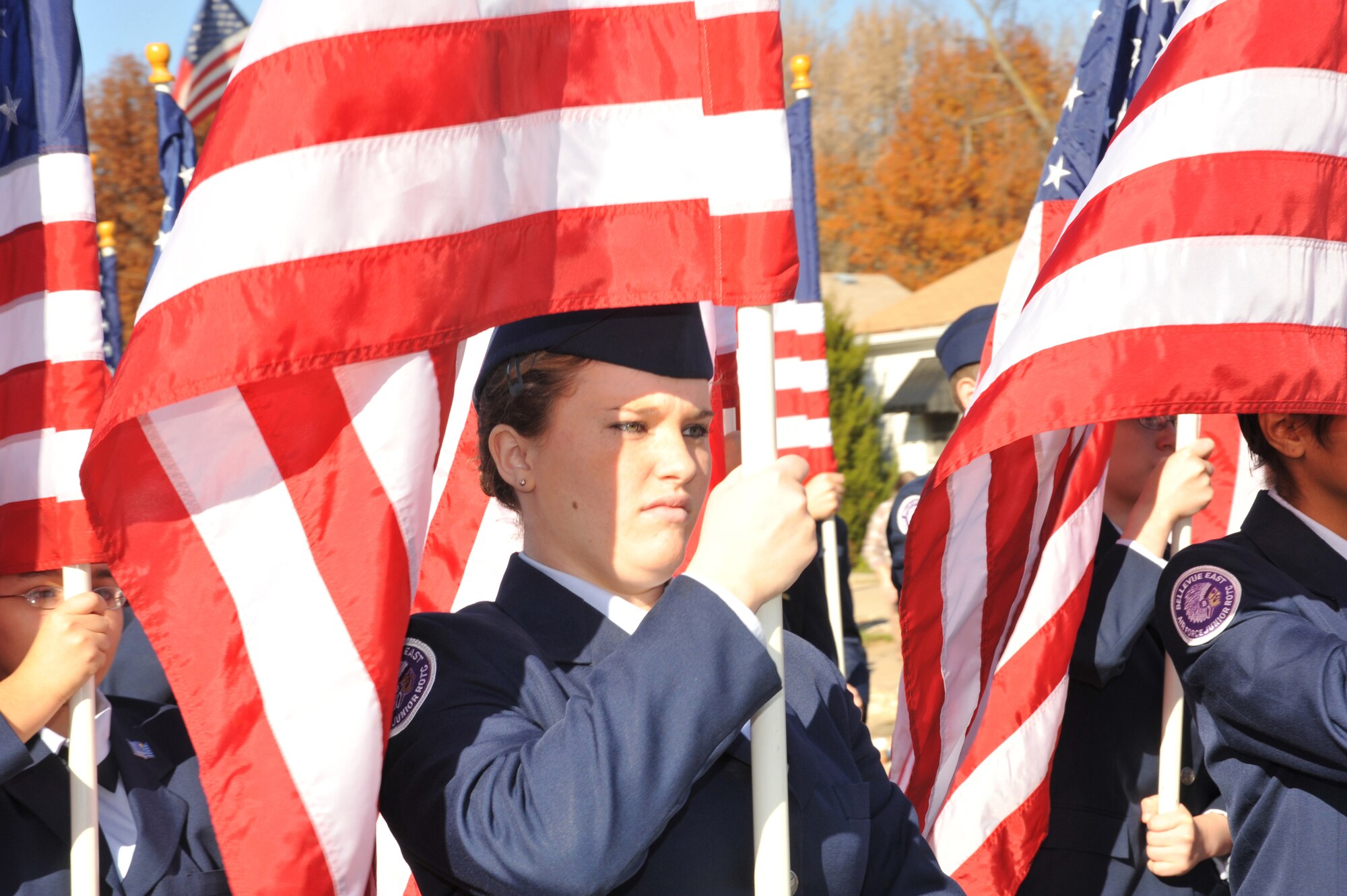 OFFUTT AIR FORCE BASE, Neb. - Members of the Bellevue East High School Air Force Junior ROTC proudly display American flags as they march down Mission Avenue in Olde Towne Bellevue, Neb.,  Nov. 7 during the Annual Official Nebraska Veterans Parade. The parade, in its 10th year, honors the service and sacrifices of all military veterans and their family members. 
U.S. Air Force photo by D.P. Heard