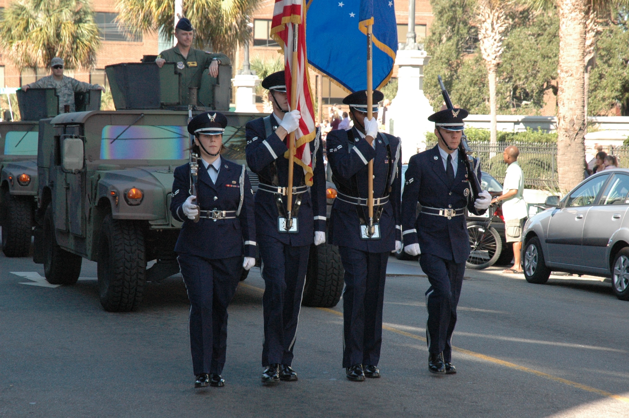 Col. John Wood travels in a Humvee behind the Air Force Honor Guard during the Veterans Day Parade Oct. 8 in downtown Charleston, S.C. The Ralph H. Johnson VA Medical sponsored the parade. Colonel Wood is the 437th Airlift Wing commander. (U.S. Air Force photo/Senior Airman Dani Shea)

