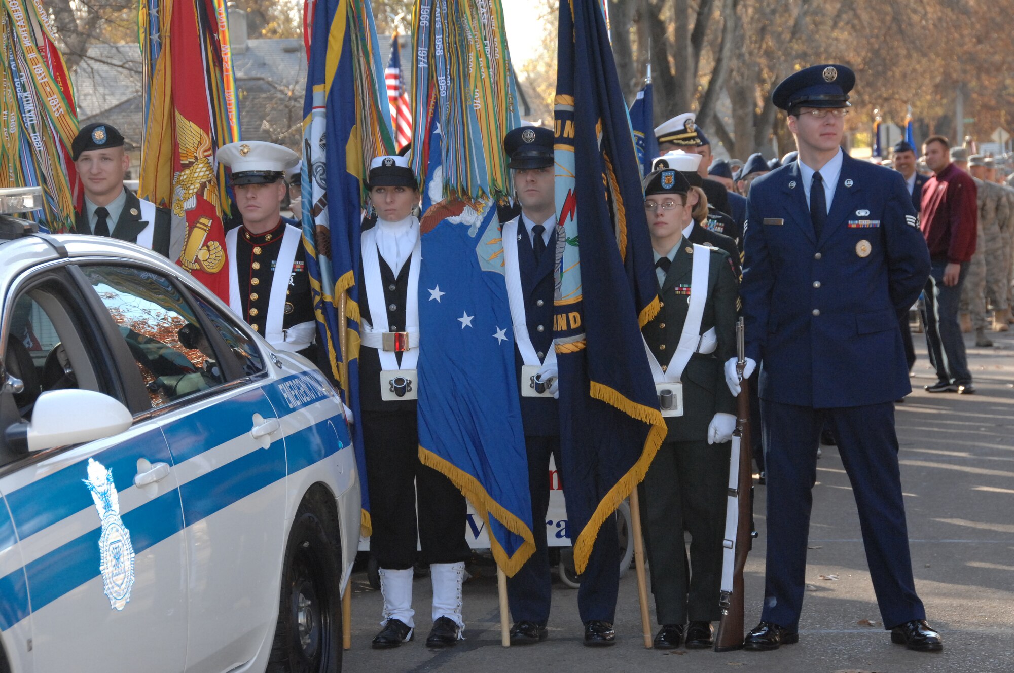 OFFUTT AIR FORCE BASE, Neb. - U.S. Strategic Command's Color Guard stands by on the corner of Mission Avenue and Jackson Street in Olde Towne Bellevue for the start of Nebraska's Official Veterans Parade Nov. 7.  More than 400 troops from Offutt participated in the annual event recognizing military veterans. The event, in its 10th year, honors the service and sacrifices of all military veterans and their family members. U.S. Air Force photo by Kendra Williams