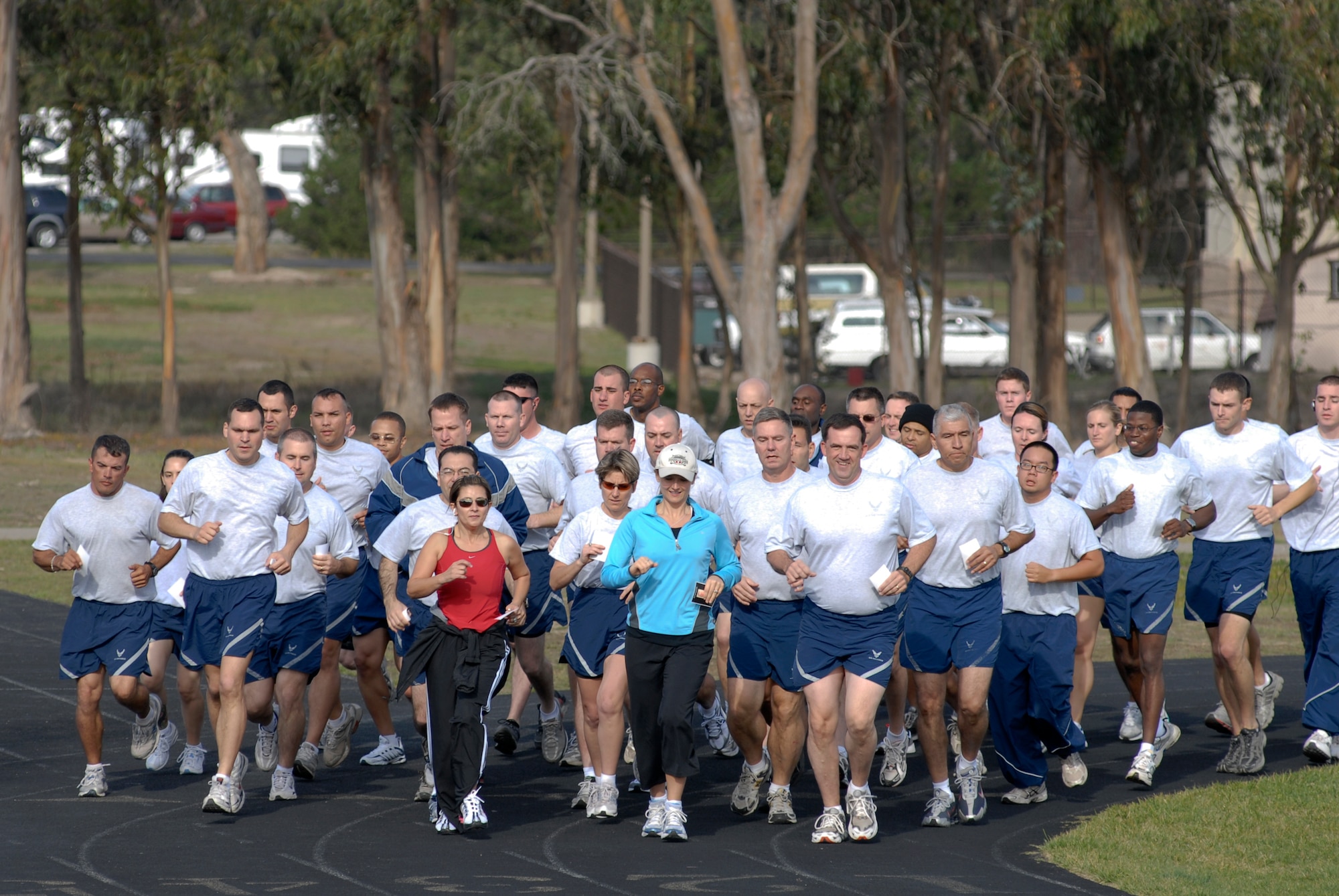 VANDENBERG AIR FORCE BASE, Calif. – Family, friends and members from the 30th Mission Support Group here ran in honor of Navy Cmdr. Duane G. Wolfe at the base track Nov. 9. The 30th MSG held a memorial ceremony as a tribute to Commander Wolfe. (U.S. Air Force photo/Senior Airman Andrew Satran)