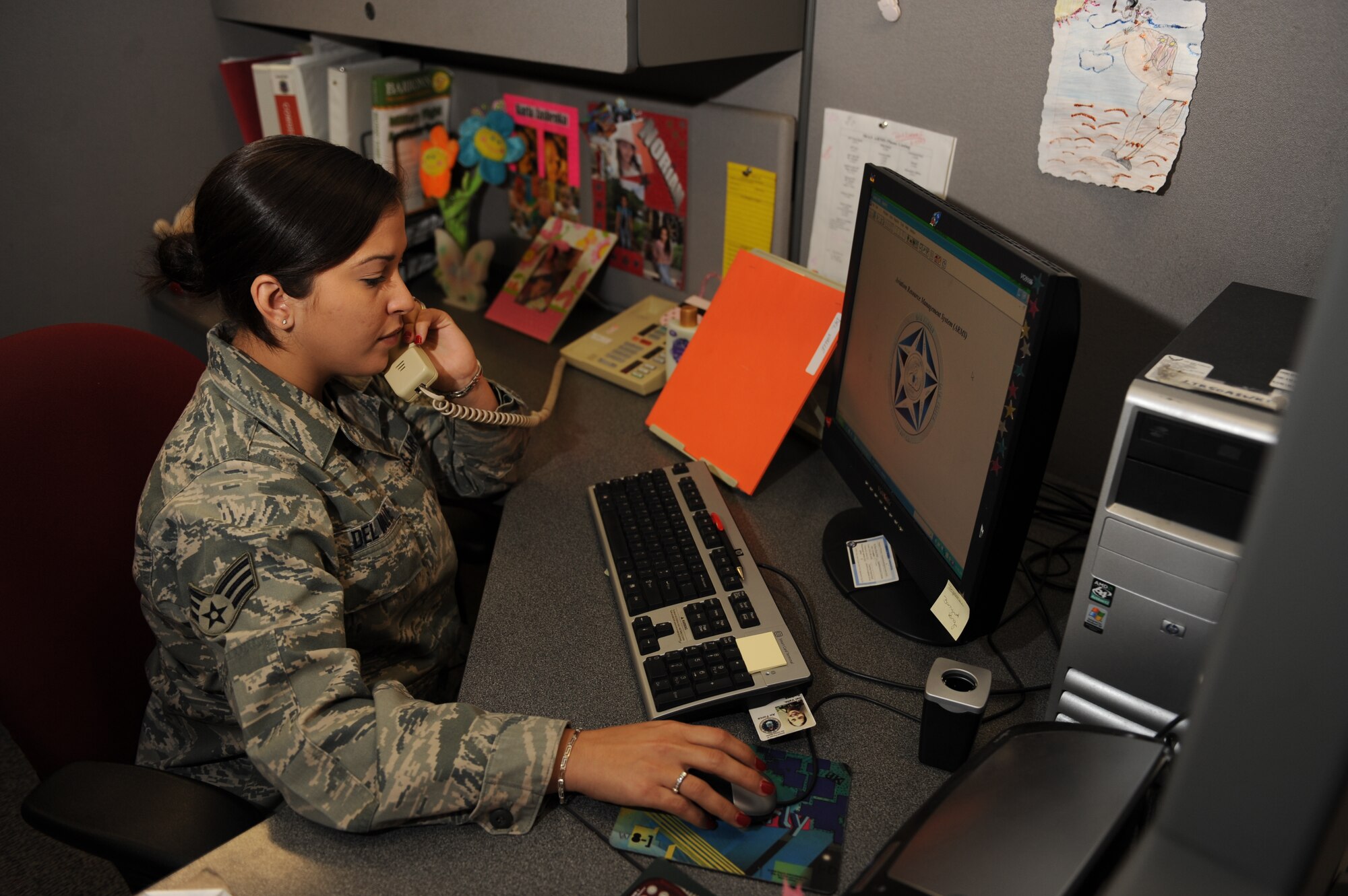 Senior Airman Barbara Del Valle performs a mission review after training a C-130H flight. Airman Del Valle monitored 225 aircrew members' go or no-go procedures ensuring flightline readiness and the mission readiness of all 50 Airlift Squadron crews. She also monitored 846 sorties and 1,925 flight hours leading to an error-free fiscal year closeout to Air Mobility Command Headquarters. Already a Community College of the Air Force graduate, Airman Del Valle is taking the final six credits of her bachelor's degree program in business while maintaining a 3.0 grade-point average. (U.S. Air Force photo by Staff Sgt. Chad Chisolm)