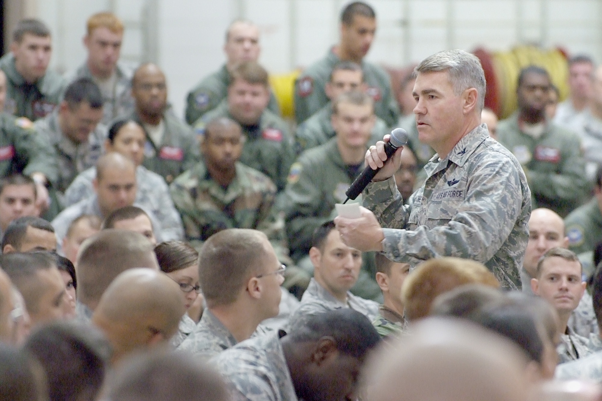 Col. Stuart Archer, 305th Air Mobility Wing Vice Commander, discusses the importance of being a good wingman with JB MDL Airmen. The annual Wingman Day is aimed at inspiring an ethos of responsible individualism that encourages all servicemembers to make responsible choices and keep others in their circles safe and healthy. (U.S. Air Force photo/Russ Meseroll)
