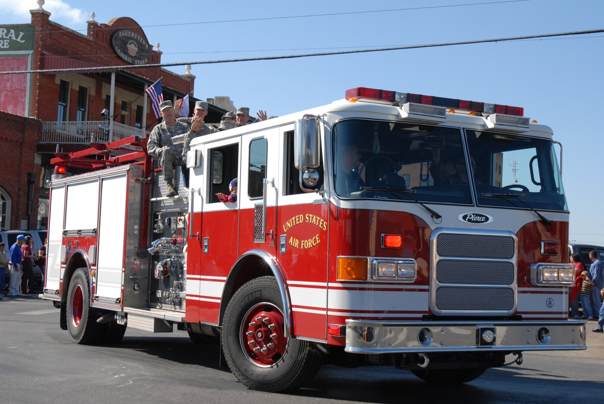 SAN ANGELO, Texas -- Airmen from Goodfellow Air Force Base ride atop a P-22 Fire Apparatus in the 2009 Veterans Day Parade, Nov. 7. (U.S. Air Force photo/Staff Sgt. Laura R. McFarlane)
