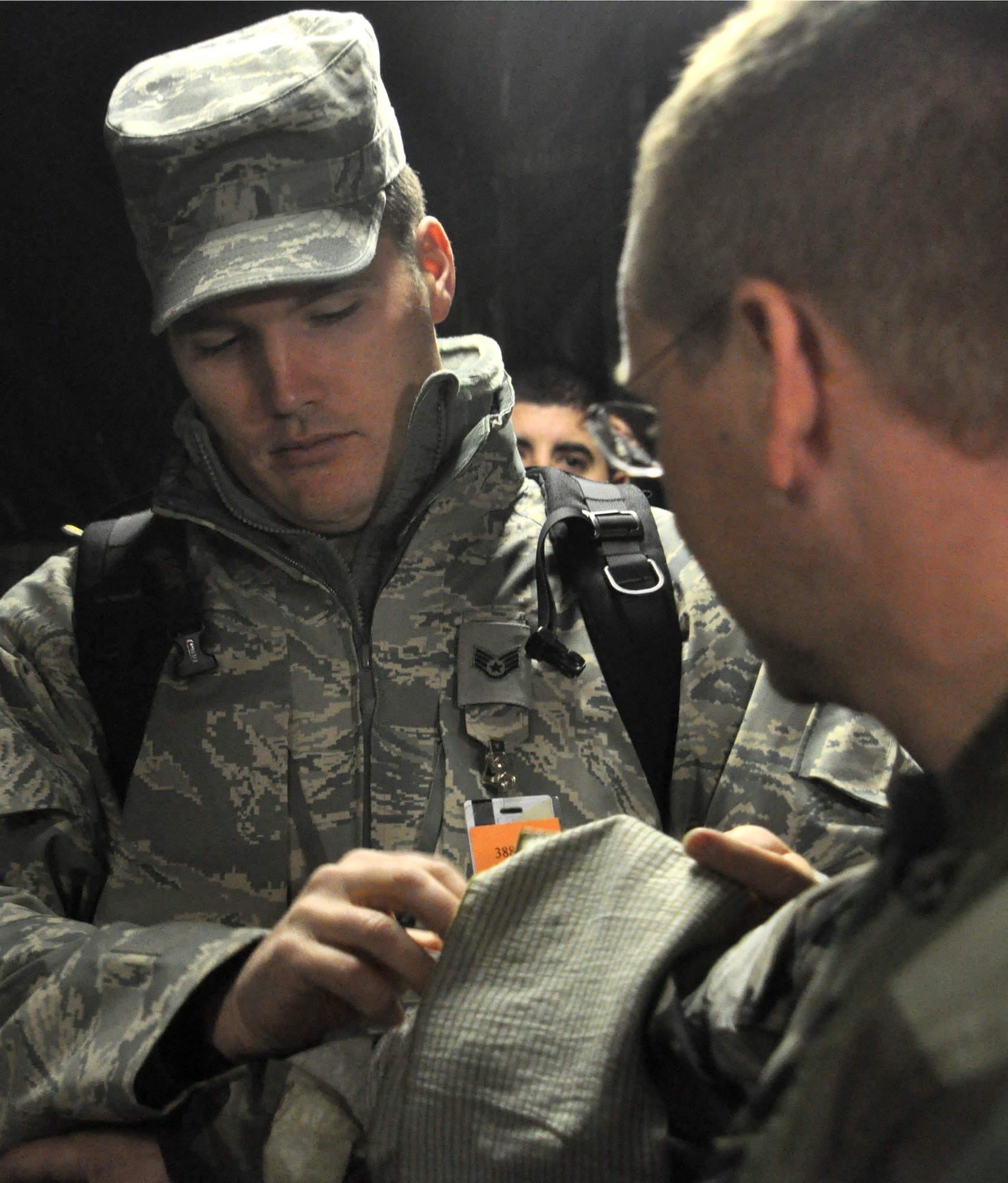 Staff Sgt. Jared Jeppsen of the 419th Medical Squadron demonstrates the proper use of the Israeli Bandage during the November ORE. Sergeant Jeppsen was a part of the exercise evaluation team, which ran training scenarios during the exercise.  (U.S. Air Force photo/Staff Sgt. Kyle Brasier)