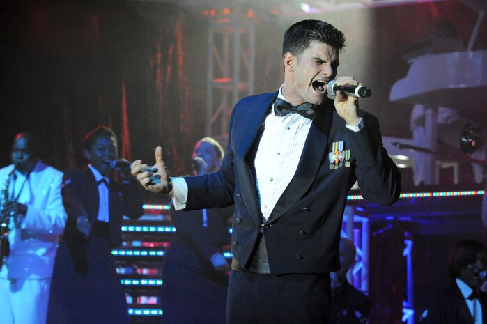 Staff Sgt. Robert Kalert sings during the Tops in Blue "To Dream" show at the North Charleston Performing Arts Center in North Charleston Nov. 8. Tops in Blue is an elite group composed of more than 30 of the most talented competitors within the Air Force. Sergeant Kalert is a vocalist with Tops in Blue. (U.S. Air Force photo/Staff Sgt. Marie Brown)