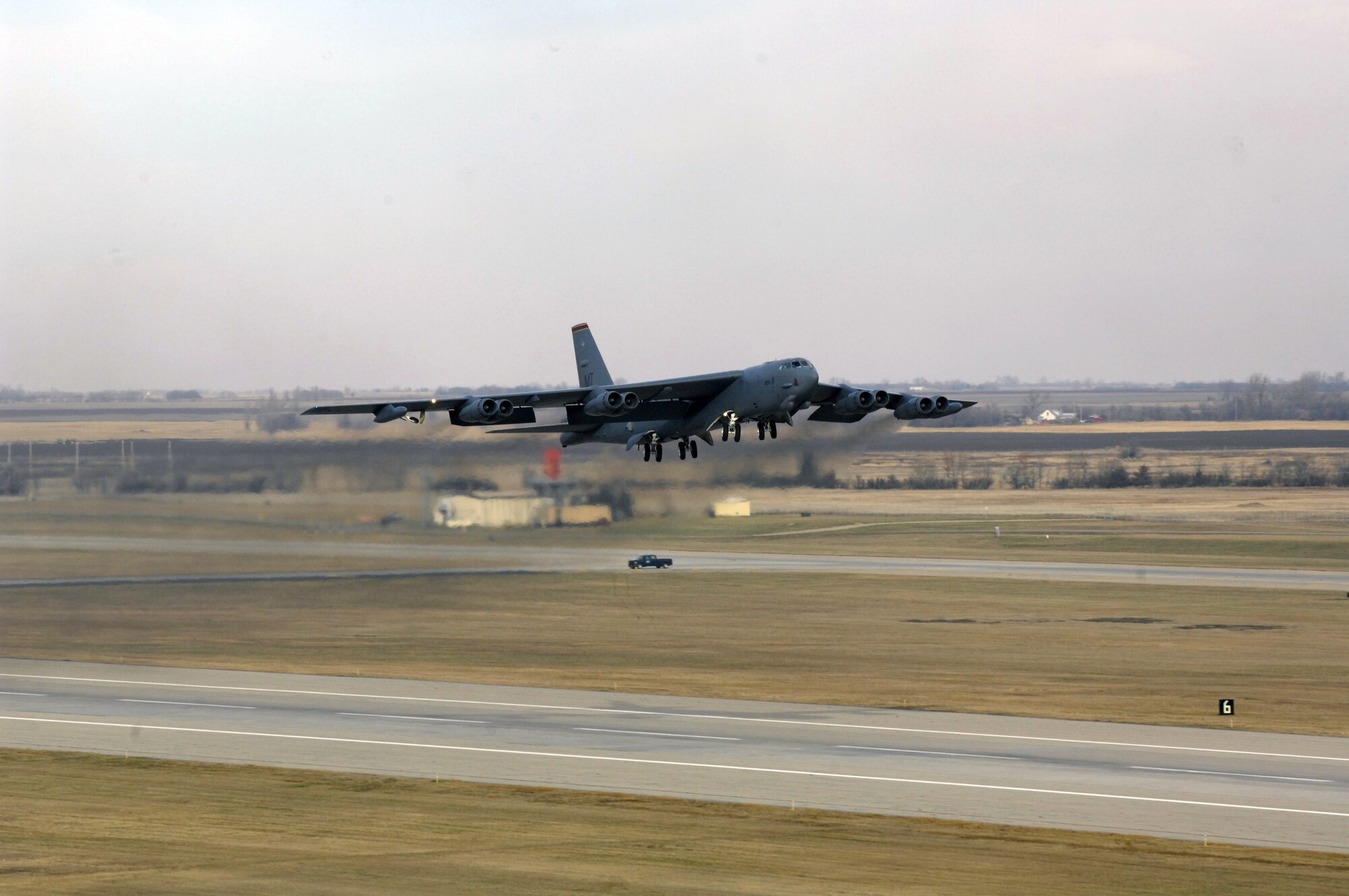 MINOT AIR FORCE BASE, N.D. - A B-52H Stratofortress speeds down the runway during the rapid launch portion of Prairie Vigilance 10-2 here Nov. 5. Prairie Vigilance is a combined-wing nuclear operational readiness exercise designed to demonstrate safe, secure, reliable nuclear weapons standards and procedures. A sequence of seven B-52s successfully launched confirming the Air Force’s agile ability to respond when called upon. (U.S. Air Force photo by Airman 1st Class Jesse Lopez)