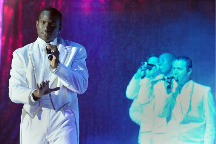 Staff Sgt. Wendall Boone sings during the Tops in Blue "To Dream" show at the North Charleston Performing Arts Center in North Charleston Nov. 8. Tops in Blue tours worldwide each year under the sponsorship of the Air Force Services Agency in San Antonio, Texas. Sergeant Boone is a vocalist with Tops in Blue. (U.S. Air Force photo/Staff Sgt. Marie Brown)