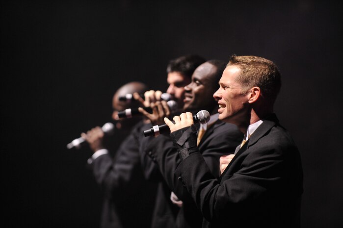 Staff Sgt. Timothy Womble sings during the Tops in Blue "To Dream" show at the North Charleston Performing Arts Center in North Charleston Nov. 8. Tops in Blue tours worldwide each year under the sponsorship of the Air Force Services Agency in San Antonio, Texas. Sergeant Womble is a vocalist with Tops in Blue. (U.S. Air Force photo/James Bowman)