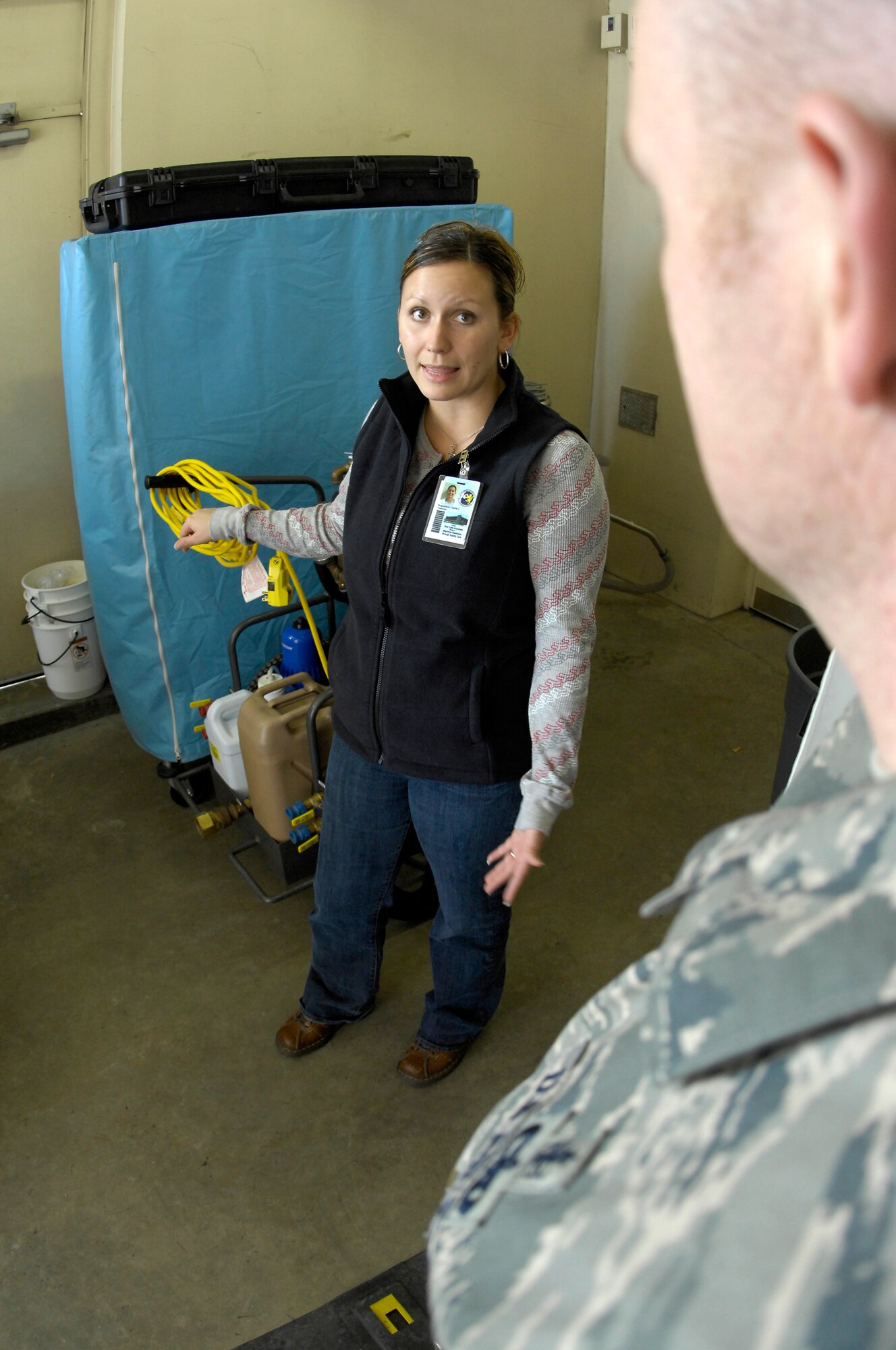 MINOT AIR FORCE BASE, N.D. -- Callie Augustson, 5th Medical Support Squadron medical readiness planner and analyst, refreshes Tech. Sgt. Keith Lewis, 5th Medical Operations Squadron aerospace and operational physiology noncommissioned officer-in-charge, on the basics of patient decontamination during a training exercise to ensure they are ready to ensure Minot Airmen are safe Nov. 5 here. The medical readiness flight ensures 5th Medical Group Airmen are ready to deploy in support of their countries interests around the world. The 5th MDG recently underwent a Health Services Inspection that covered 16 areas in four major categories. The group received an overall rating of excellent with eight of the graded areas receiving an outstanding, the highest rating possible. (U.S. Air Force photo by Airman 1st Class Benjamin Stratton)