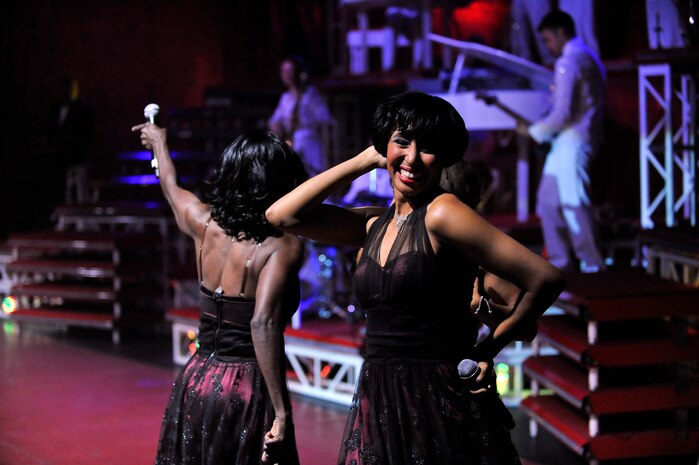 Staff Sgt. Aisha Smith dances in the Tops in Blue "To Dream" show at the North Charleston Performing Arts Center in North Charleston Nov. 8. Tops in Blue performers not only must master the instrumental, vocal, choreography and staging requirements of the performance, but also the responsibilities of being their own technical staff. Sergeant Smith is a vocalist with Tops in Blue. (U.S. Air Force photo/James Bowman)