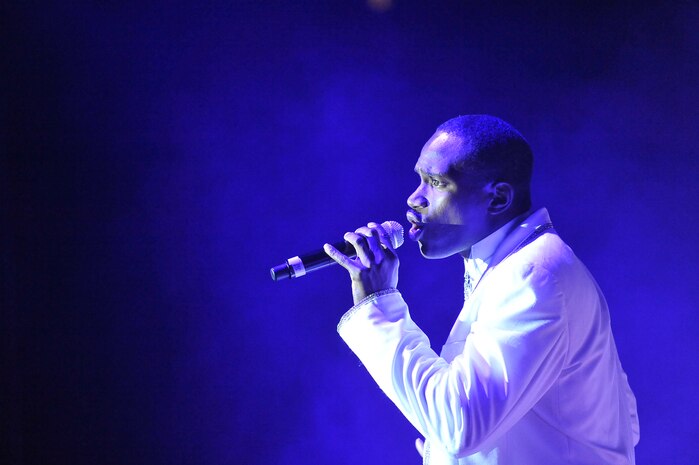 Staff Sgt. Wendall Boone sings during the Tops in Blue "To Dream" show at the North Charleston Performing Arts Center in North Charleston Nov. 8. Tops in Blue tours worldwide each year under the sponsorship of the Air Force Services Agency in San Antonio, Texas. Sergeant Boone is a vocalist with Tops in Blue. (U.S. Air Force photo/James Bowman)