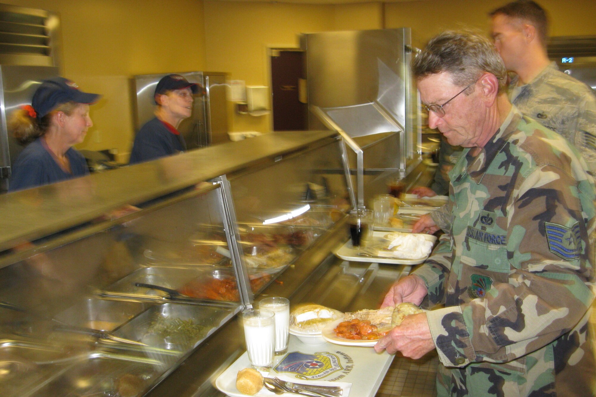 GRISSOM AIR RESERVE BASE, Ind., -- Reservists from the 434th Air Refueling Wing take a brief time out from a busy Unit Training Assembly for lunch at the Grissom Dining Facility.   The 434th Services Flight manages the dining facility and works to ensure tasty and healthy meals for wing personnel.  (U.S. Air Force photo/Senior Airman Carl Berry)