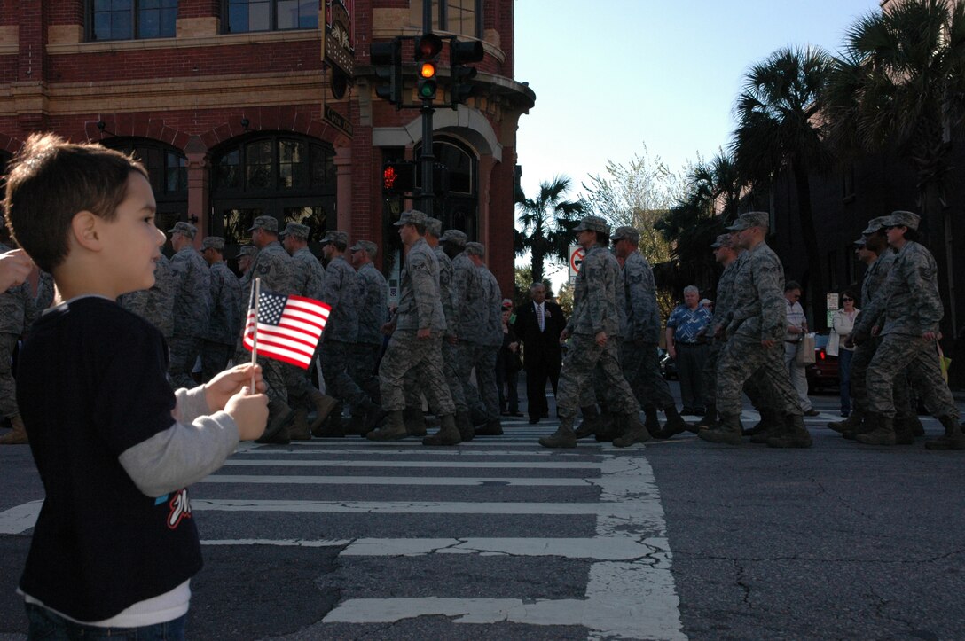 The 315th Airlift Wing Honor Guard from Charleston AFB, S.C., march the Colors during the Charleston Annual Tri-County Veteran’s Day Parade.  This was the city’s 12th year hosting the Veterans Day Parade.  (Air Force photo/ SrA Dani Shea)
