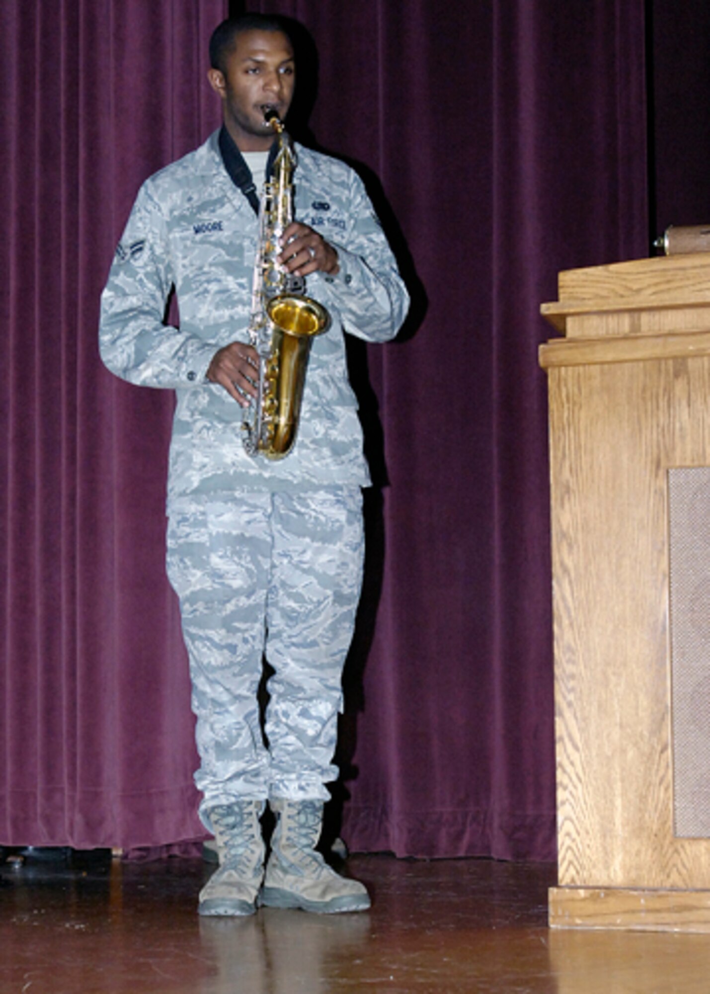 FAIRCHILD AIR FORCE BASE, Wash. - Airman 1st Class Jay Moore, 92nd Logistics Readiness Squadron, performs the U.S. National Anthem during the quarterly awards ceremony here Oct. 30. (U.S. Air Force photo / Staff Sgt. Eunique Stevens) 
