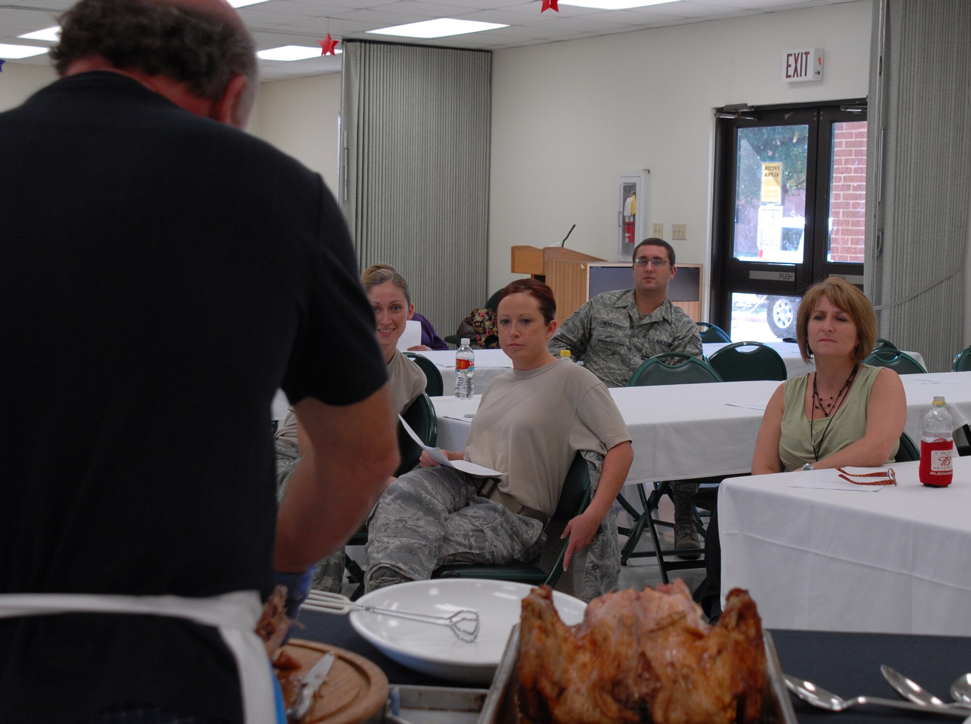 GOODFELLOW AIR FORCE BASE, Texas -- Chef Henry Wiens demonstrates the best way to carve a turkey during the "Creating a Traditional Thanksgiving Dinner" seminar, Nov. 5, 2009. Chef Henry is executive chef and Director, Food and Nutrition Department, at San Angelo Community Medical Center. (U.S. Air Force photo/Staff Sgt. Laura R. McFarlane)

