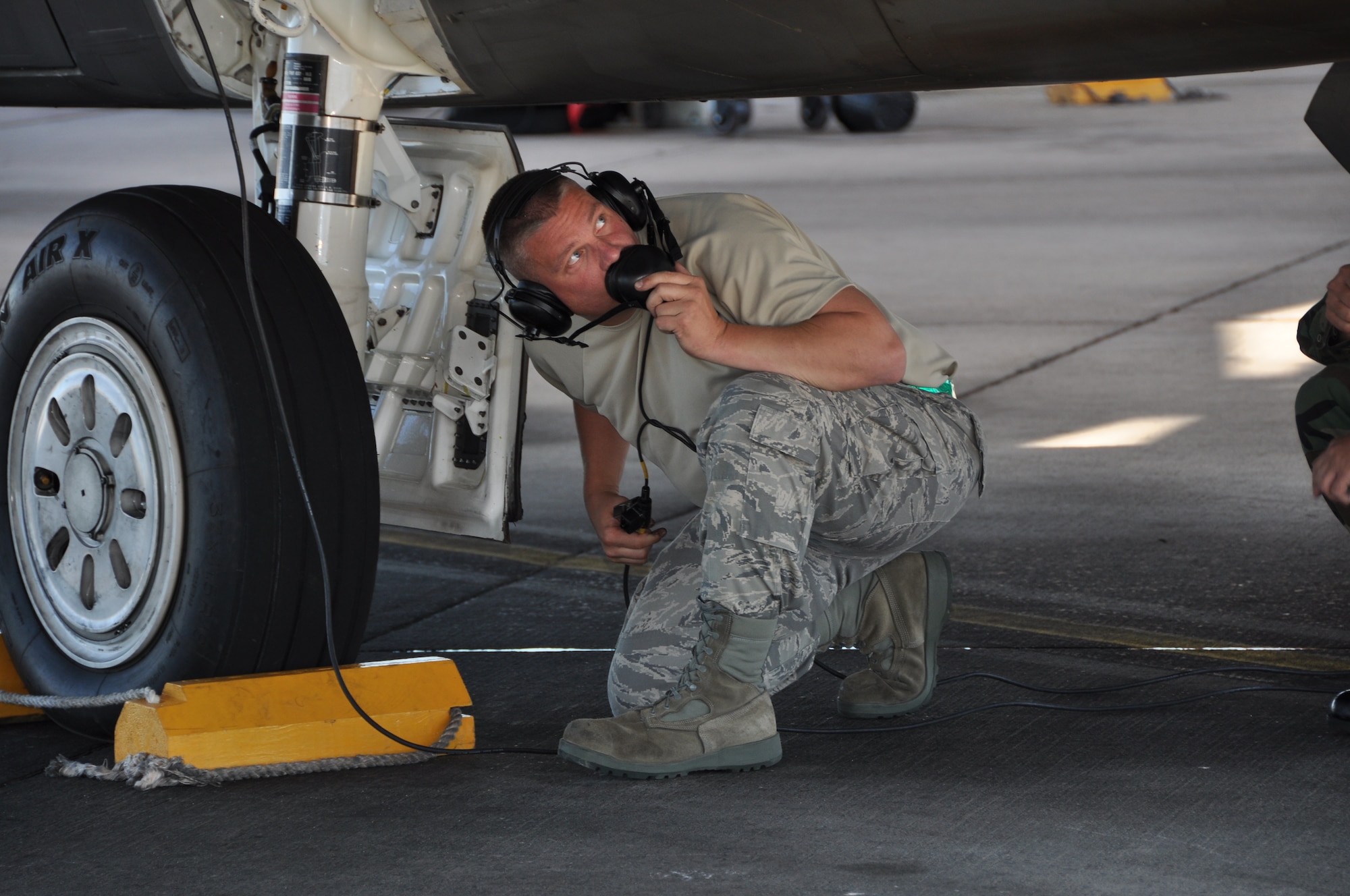 Senior Airman Derrick Bell, 372nd Training Squadron Mission Readiness Airmen student, inspects the F-22 Raptor before he launches the jet.  (U.S. Air Force photo/Airman 1st Class Veronica McMahon)