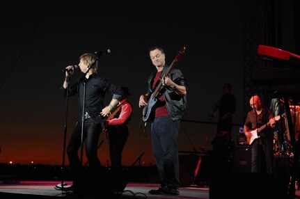 Gary Sinise (right) and Vocalist Jeff Vezain perform with the Lt. Dan Band during a concert Nov. 6 at Randolph Air Force Base. This performance was their last before departing for Afghanistan where they will perform for the troops there Thanksgiving Day.  (U.S. Air Force photo/Rich McFadden)
