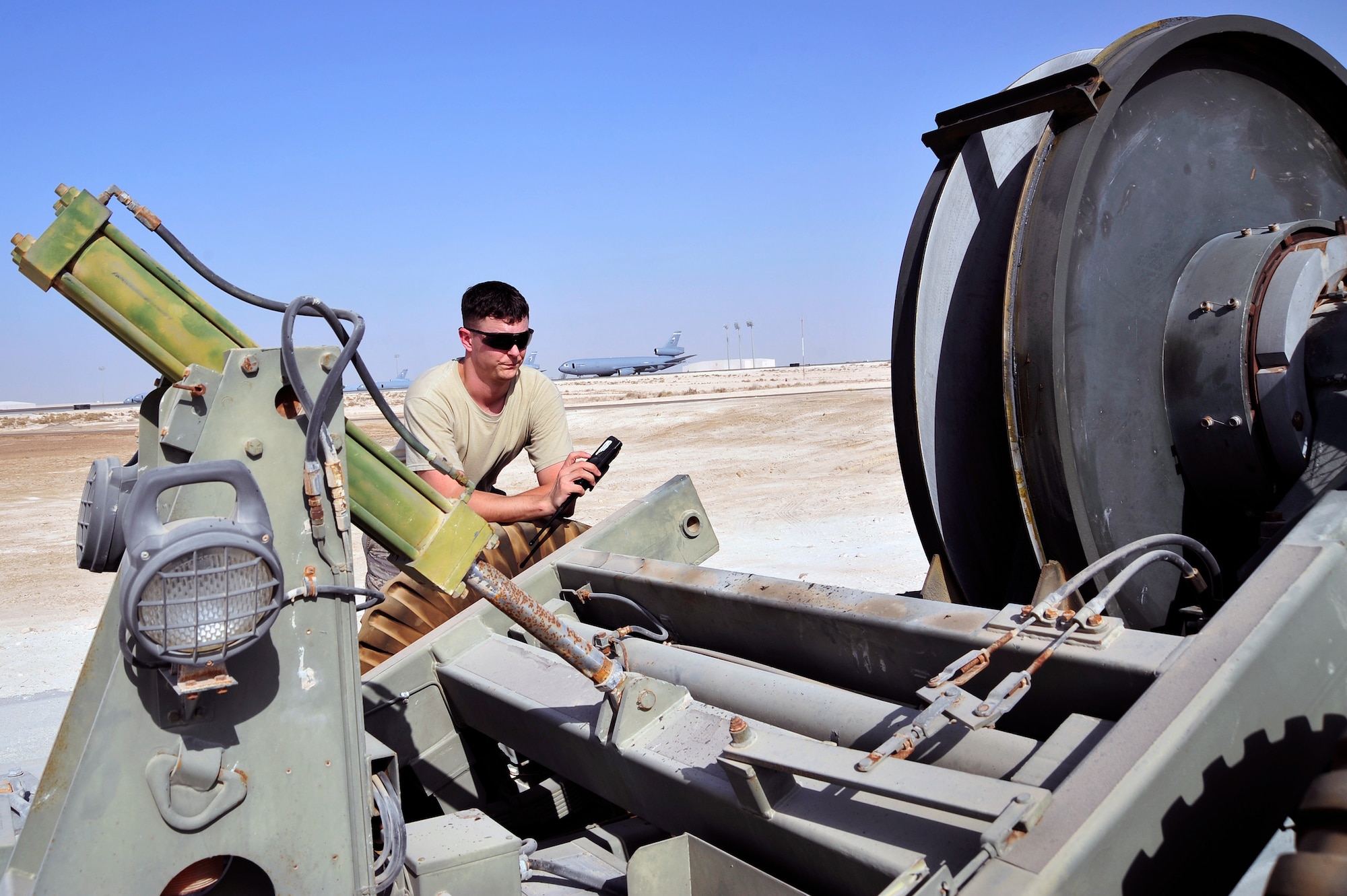 SOUTHWEST ASIA -Staff Sgt. Matthew Nimick, 380th Expeditionary Civil Engineer Squadron, monitors a mobile aircraft arresting system (MAAS) engine prior to an annual certification Nov. 8, 2009. Sergeant Nimick is deployed from Scott Air Force Base, Ill., and grew up in Archbald, Pa. (U.S. Air Force photo/Tech. Sgt. Charles Larkin Sr)