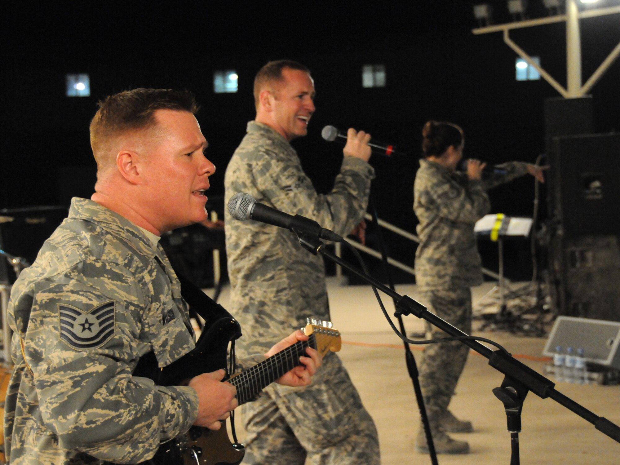 Air Forces Central Command band, Sirocco, rocks out for an audience of deployed servicemembers at an undisclosed location in Southwest Asia, Nov. 7, 2009. The band is deployed from Lackland Air Force Base, Texas in support of operations Iraqi Freedom and Enduring Freedom. (U.S. Air Force Photo/Tech. Sgt. Jason W. Edwards)