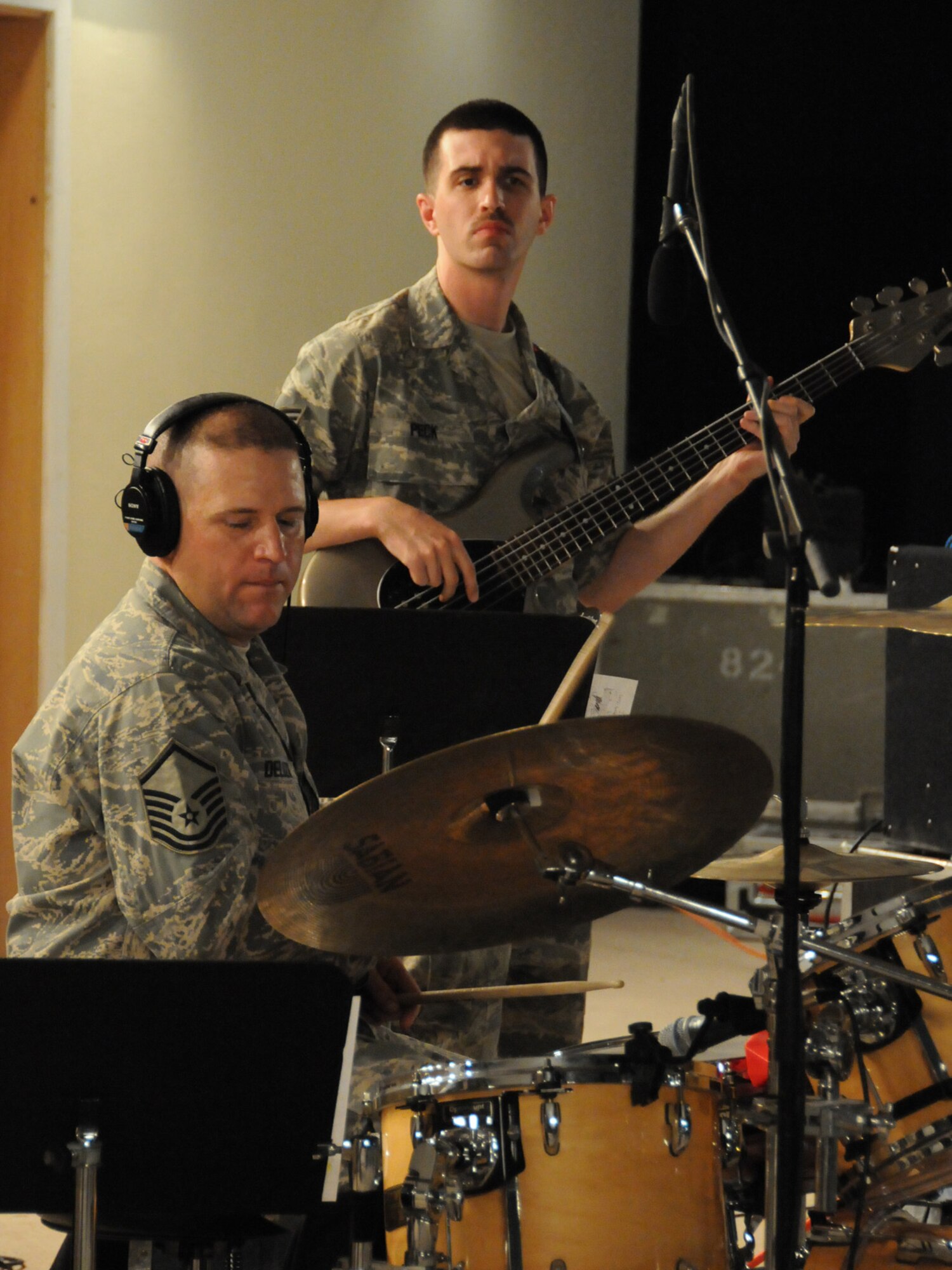 Air Forces Central Command band, Sirocco, rocks out for an audience of deployed servicemembers at an undisclosed location in Southwest Asia, Nov. 7, 2009. The band is deployed from Lackland Air Force Base, Texas in support of operations Iraqi Freedom and Enduring Freedom. (U.S. Air Force Photo/Tech. Sgt. Jason W. Edwards)