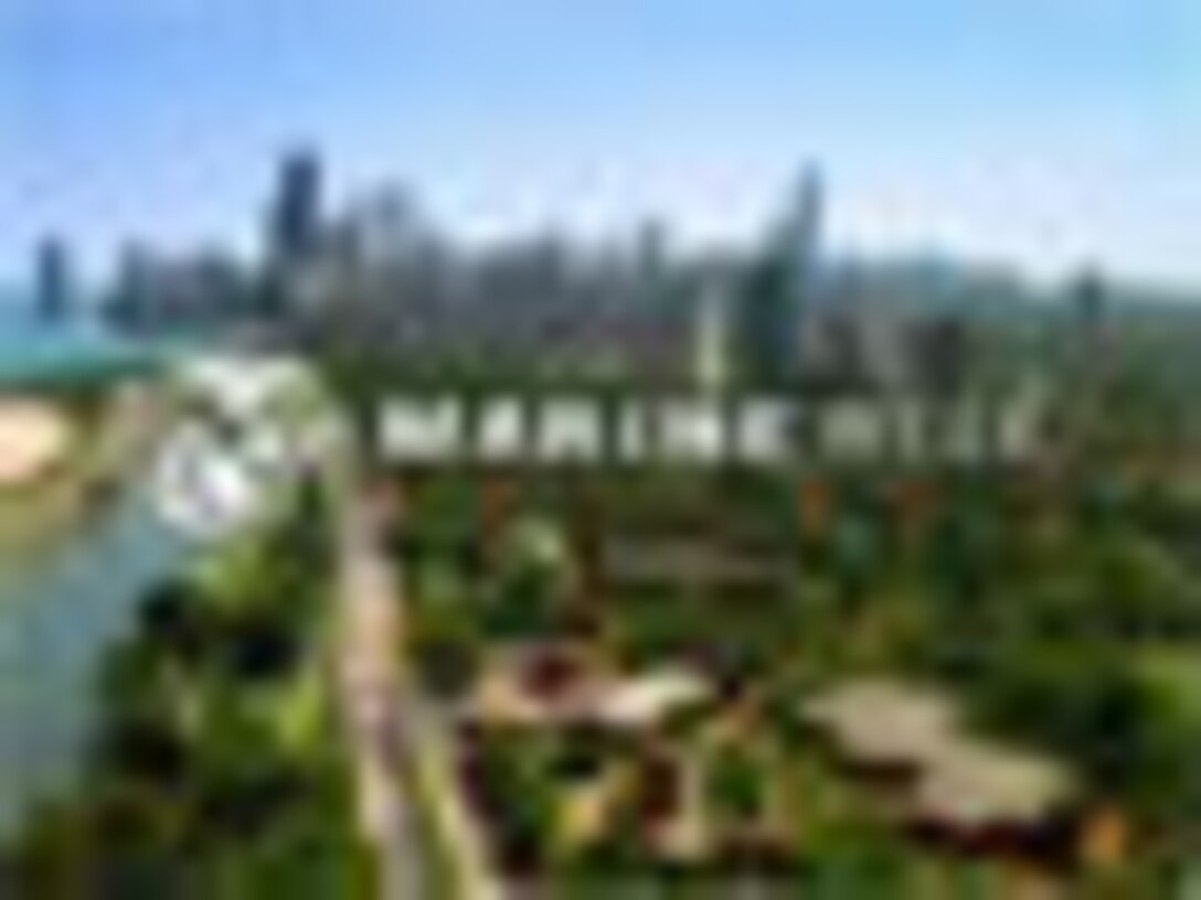 Marine Capt. James R. Stover of the 15th Marine Expeditionary Unit (Special Operations Capable) directs a forklift as it unloads crates of fresh water at a local mosque that is temporarily being used as a refugee shelter.