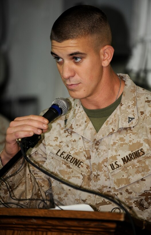 Lance Cpl. Kyle Lejeune reads the birthday message written by Lt. Gen. John A. Lejeune, his great-great grandfather, to members of the 11th Marine Expeditionary Unit during a cake-cutting ceremony aboard USS Bonhomme Richard Nov. 10. “It’s something I’ve always wanted to do,” said the Naperville, Ill, native.