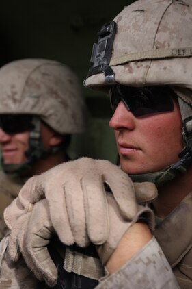 Lance Cpl. Michael Vargas, a rifleman with Company G, 2nd Battalion, 7th Marine Regiment, takes a moment to gather his composure after assaulting the Combat Center's Range 205 Nov. 11. Vargas, along with the rest of 2nd Bn., 7th Marines, will deploy with the 31st Marine Expeditionary Unit in January.