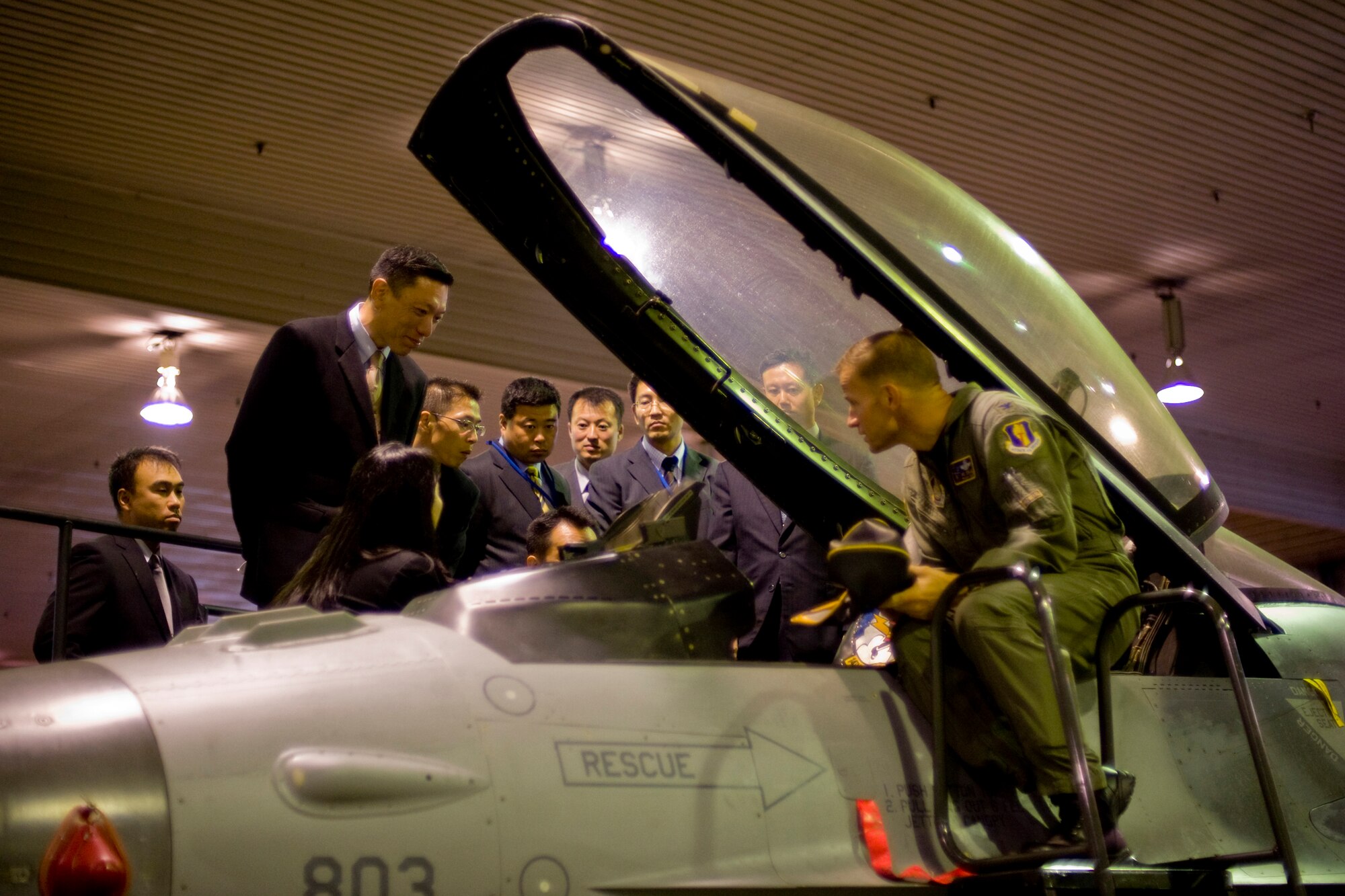 MISAWA AIR BASE, Japan -- Members of the Japan Ground Self-Defense Force ground staff office based out of Tokyo view an F-16 Fighting Falcon cockpit Nov. 10 at Hangar 911. The staff visited Misawa Air Base to better understand joint U.S. and Japan missions and the part it plays in the defense of Northern Japan. (U.S. Air Force photo/Senior Airman Jamal D. Sutter)