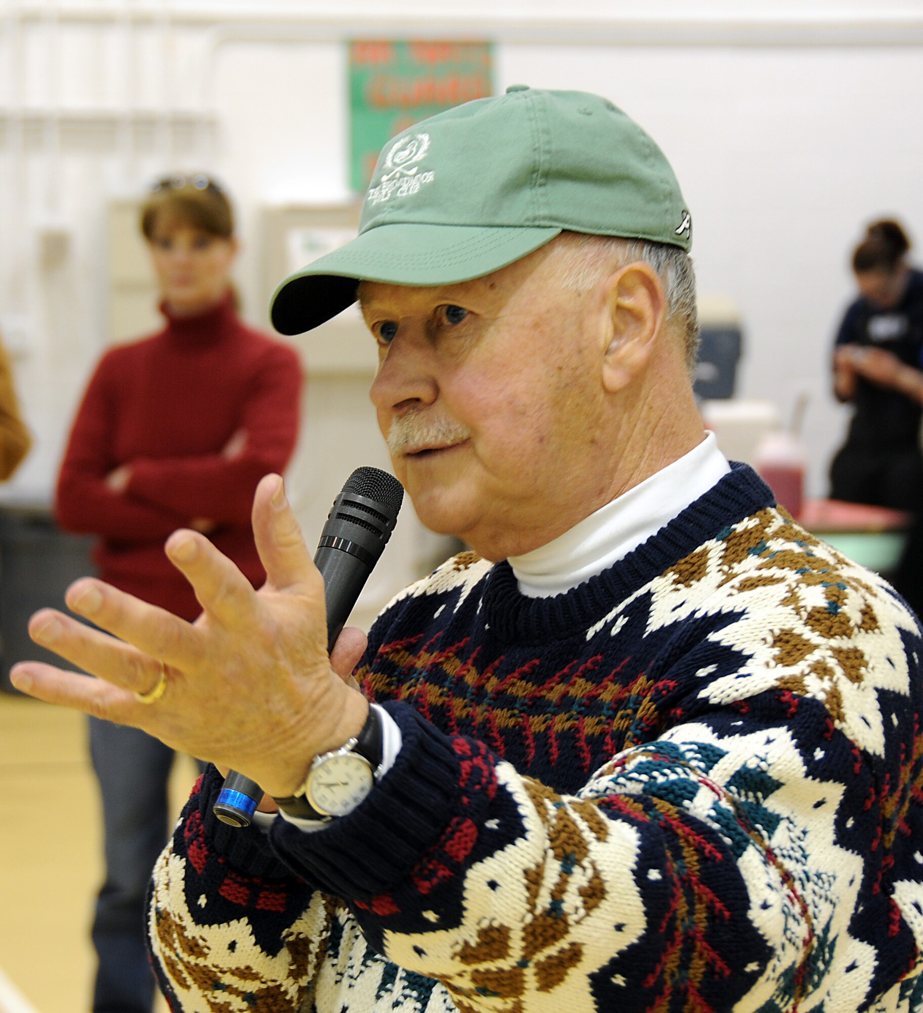 Brig. Gen. (ret.) Jake Lestenkoff, former adjutant general for the Alaska Air National Guard, addresses the crowd in the St. George School. It was a homecoming for Lestenkoff, who was born on St. George. U.S. Air Force photo by 1st Lt. John Callahan.