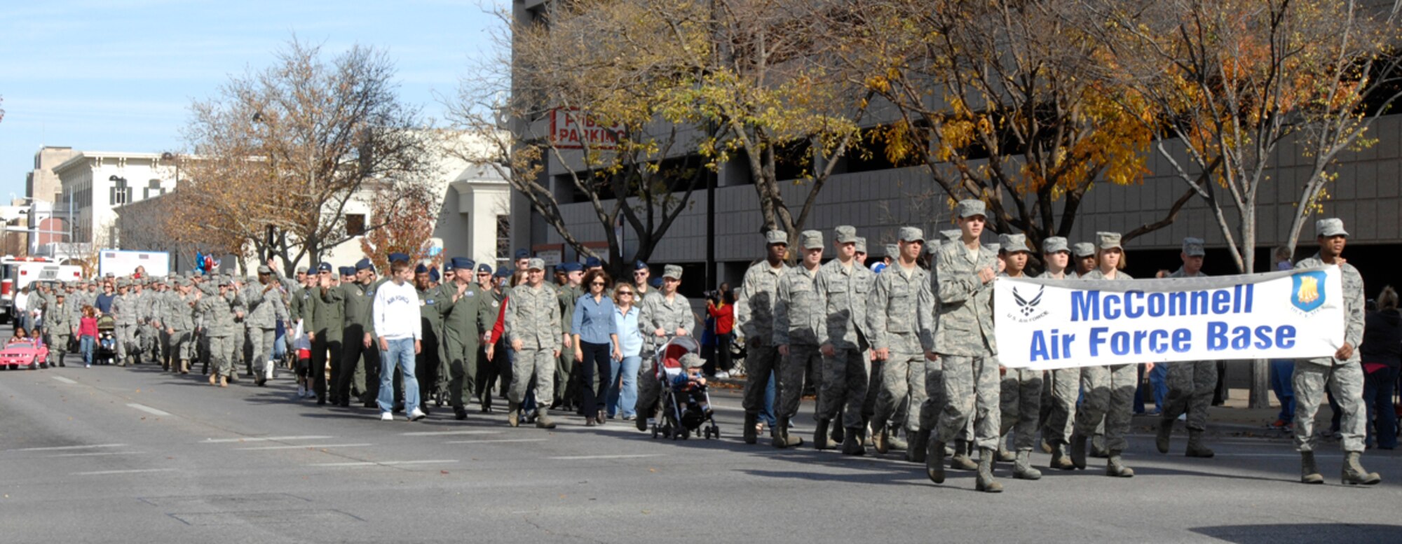 Team McConnell members march Nov. 7, 2009, in the annual Veterans Day Parade in Wichita, Kan. Veterans Day is observed on Nov. 11 regardless of the day of the week on which it falls. (U.S. Air Force photo/Senior Airman Laura Suttles)