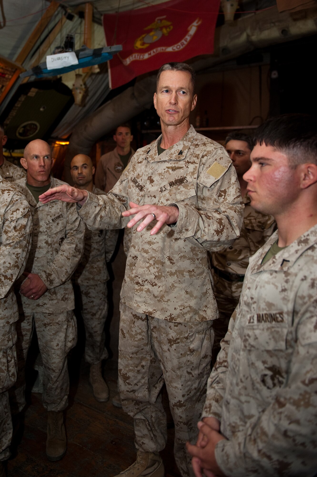 U.S. Marine Corps Col. Ben Hancock speaks to fellow Marines and other military servicemembers during a celebration in honor of the USMC's 234th birthday, Nov. 10, 2009, in Southwest Asia. (U.S. Air Force photo/Staff Sgt. Robert Barney)