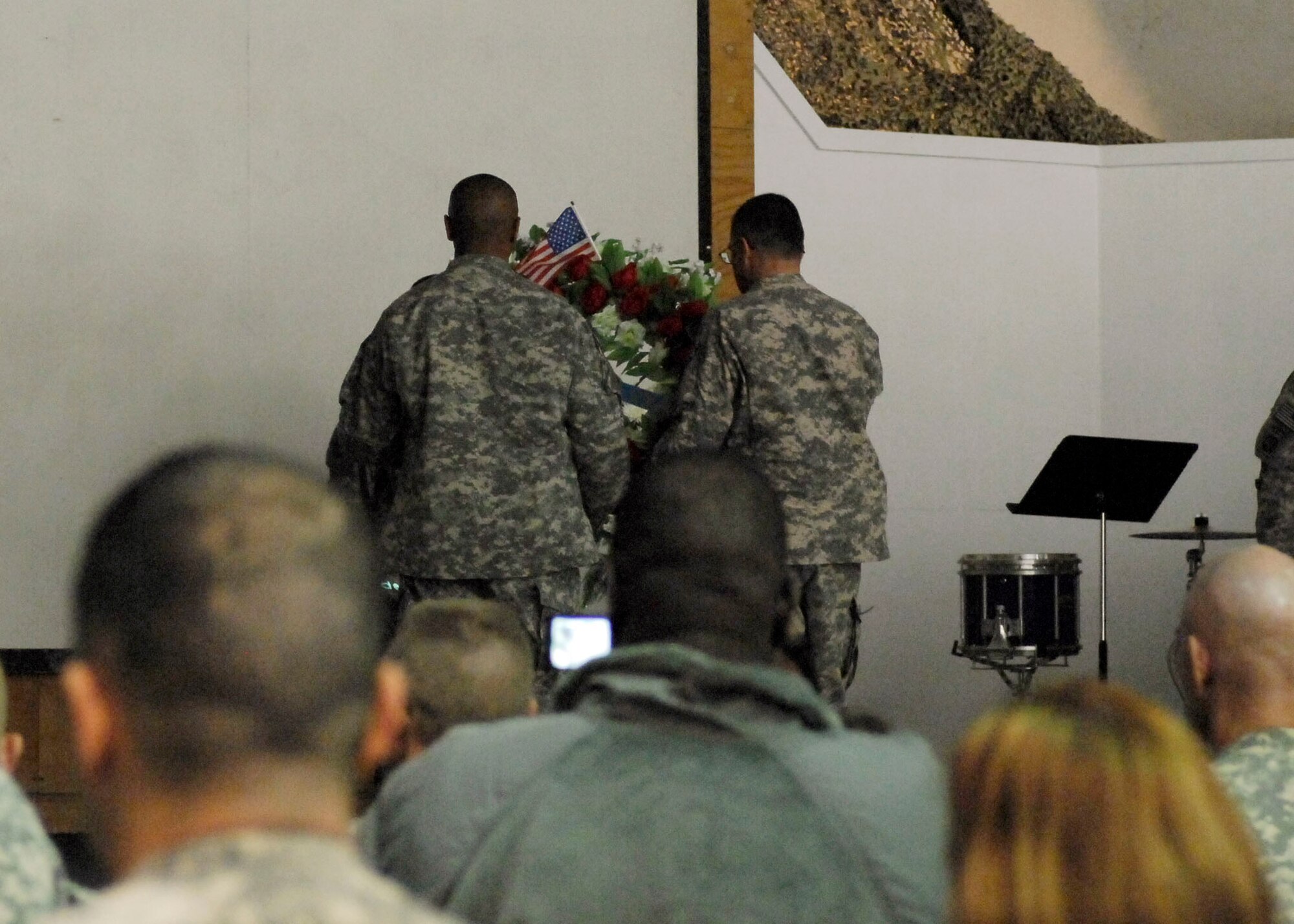 BAGRAM AIRFIELD, Afghanistan -- Major Gen. Curtis Scaparrotti, Combined Joint Task Force 82 commander, and Command Sgt. Major Thomas Capel, Division Command Sergeant Major of CJTF 82, place a wreath in honor of Veteran's Day Nov. 11, 2009.  General Scaparrotti hails from Logan, Ohio.  Command Sergeant Major Capel hails from Ellerbe, N.C.  (U.S. Air Force photo/Senior Airman Felicia Juenke)