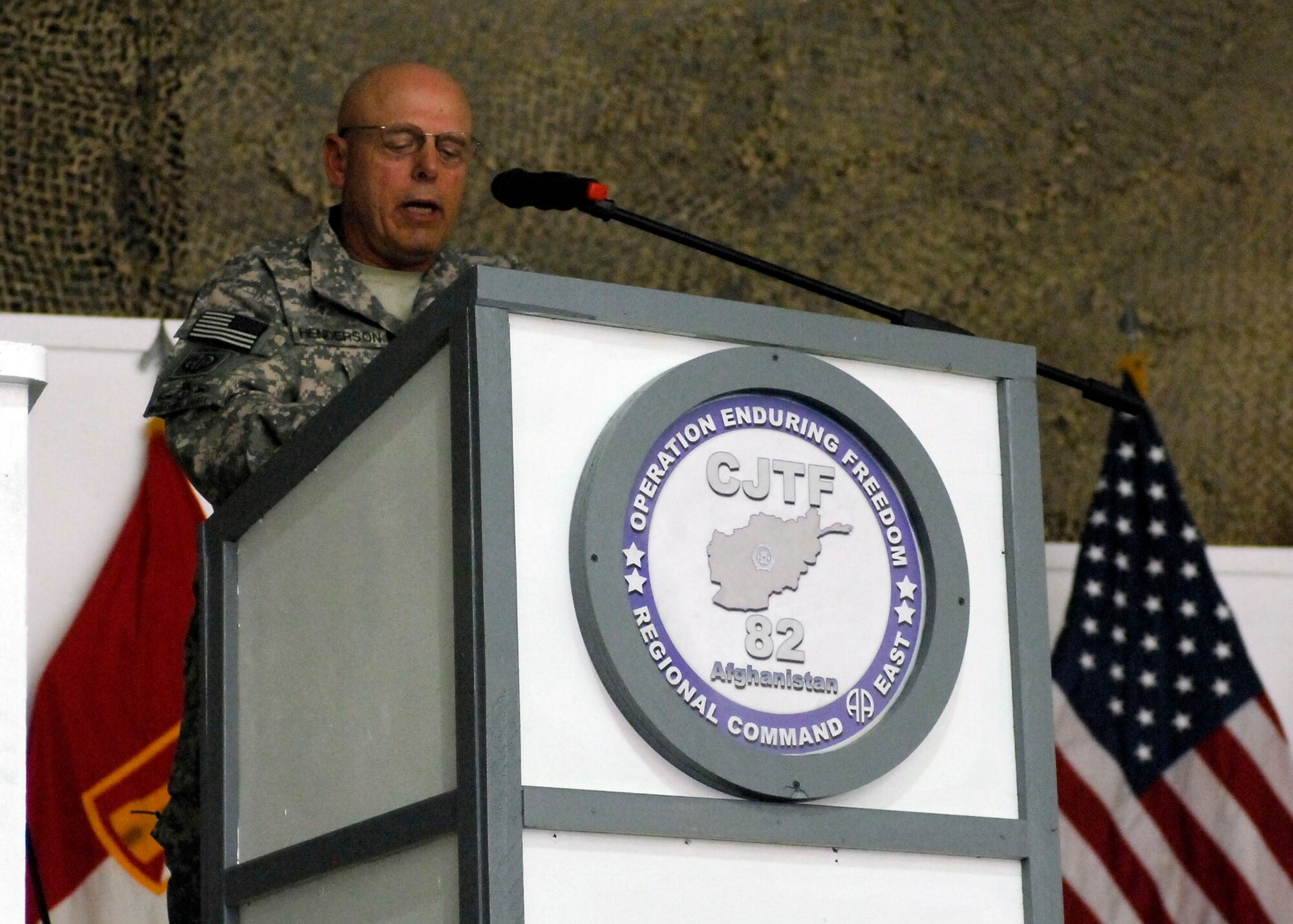 BAGRAM AIRFIELD, Afghanistan -- Retired Army Command Sgt. Major David Henderson, now the safety director for the 82nd Airborne Division, speaks during a Veteran's Day Ceremony Nov. 11, 2009.  Command Sergeant Major Henderson served the majority of his Army career at Fort Bragg as a paratrooper and retired as a brigade command sergeant major.  CSM Henderson hails from Bainbridge, Ga.  (U.S. Air Force photo/Senior Airman Felicia Juenke)
