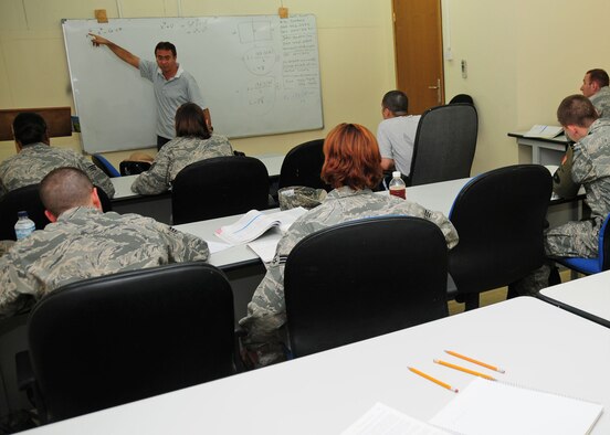 Tommy Akhavein, University of Maryland instructor, teaches Math 107 to 386th Air Expeditionary Wing members at an air base in Southwest Asia Nov. 11, 2009.  (U.S. Air Force photo/Tech. Sgt. Tony Tolley)