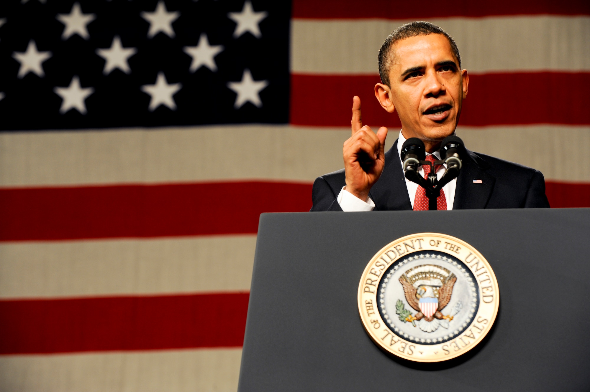 ELMENDORF AIR FORCE BASE, Alaska -- President Barack Obama gives a speech to a crowd of military personnel and civilians gathered at Elmendorf Air Force Base, Alaska, Nov. 12. The president was at the base to meet with servicemembers and offer remarks to the local community.(U.S. Air Force photo/Staff Sgt. Joshua Garcia)