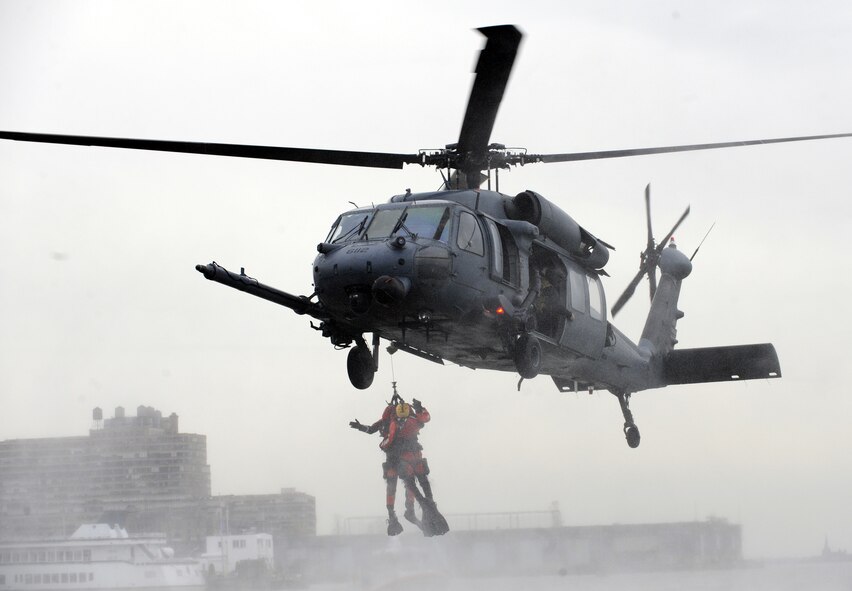 Members of the 106th Rescue Wing participated in a Veteran?s Day event in front of the Intrepid Sea-Air-Space Museum in New York City on November 11, 2009. The event included a rescue demonstration featuring HH-60s from the 101st Rescue Squadron and Guardian Angels from the 103rd Rescue Squadron. After the event the HH-60s flew over the Veteran?s Day parade route and landed on the deck of the USS Intrepid. 
(U.S. Air Force Photo/Senior Airman Chris Muncy/Released)
