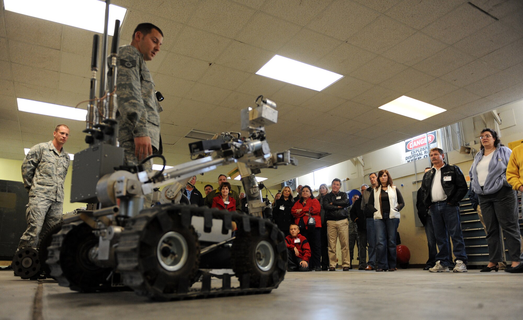 MOUNTAIN HOME AIR FORCE BASE, Idaho -- Staff Sgt. Taylor Saum, 366th Civil Engineer Squadron explosive ordnance apprentice, briefs members of the Honorary Commanders program about the HD-1 robot during the Honorary Commander Mission Support Group Orientation Tour Nov. 6. The honorary commanders program is a wing-level program that pairs civic leaders with squadron, group and wing leaders to enhance the relationships between local communities and the base. It also provides a rare glimpse of life on a military installation to members of neighboring communities -- many of whom have no connection to the Air Force or prior knowledge of the military. (U.S. Air Force photo by Airman 1st Class Debbie Lockhart)